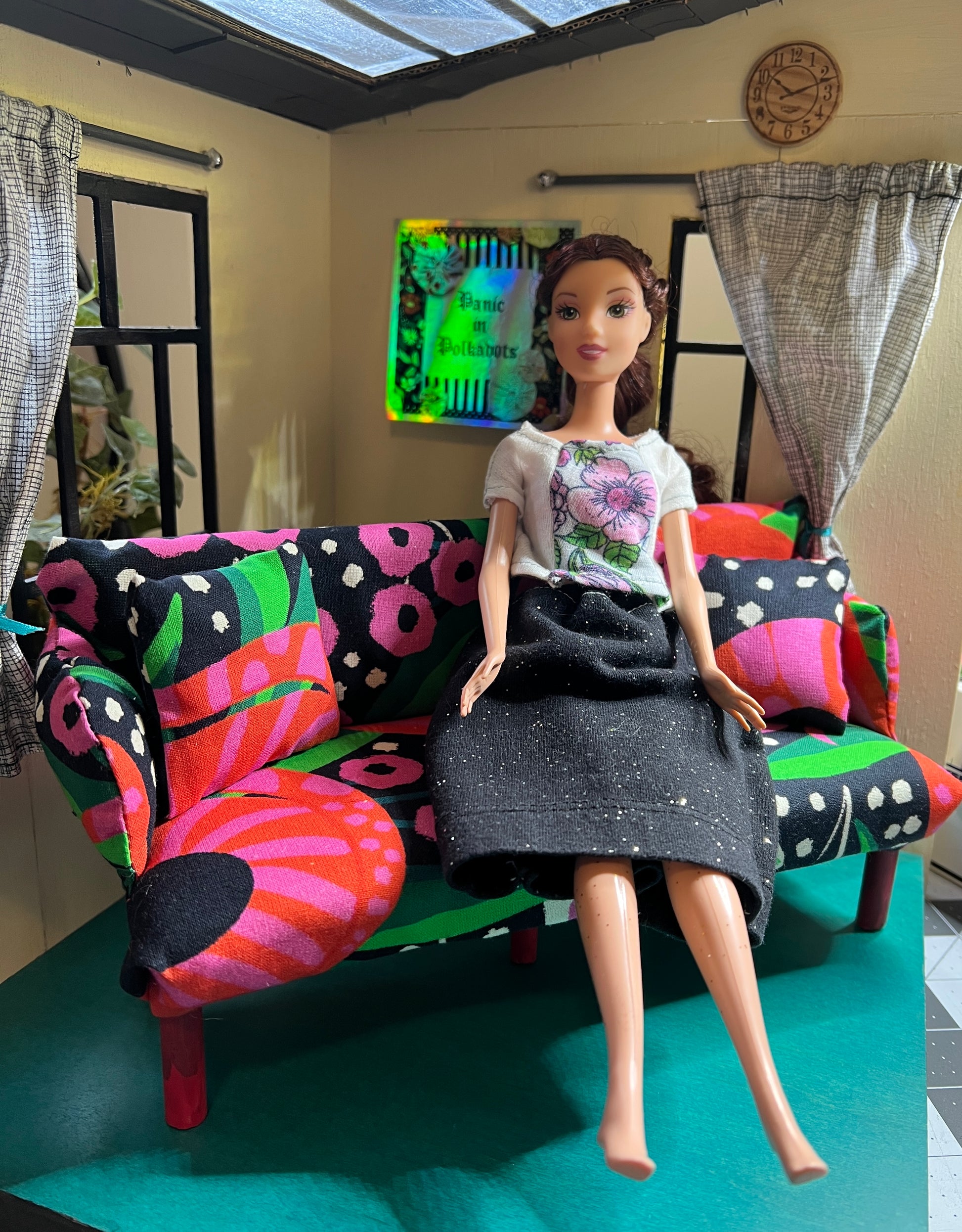 Bold bright handmade couch with Barbie for scale, not included