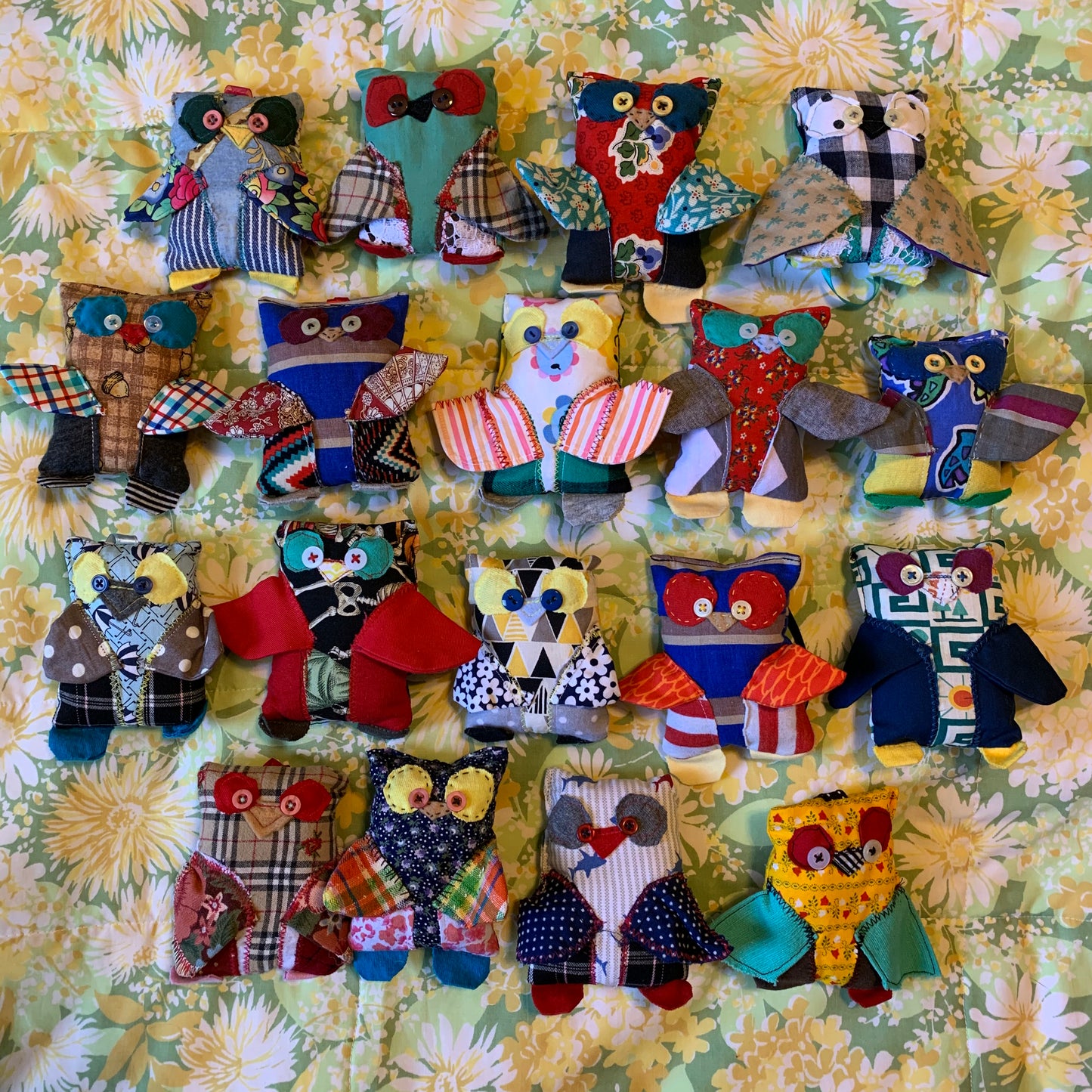 another aerial view of mini owls against a floral green background