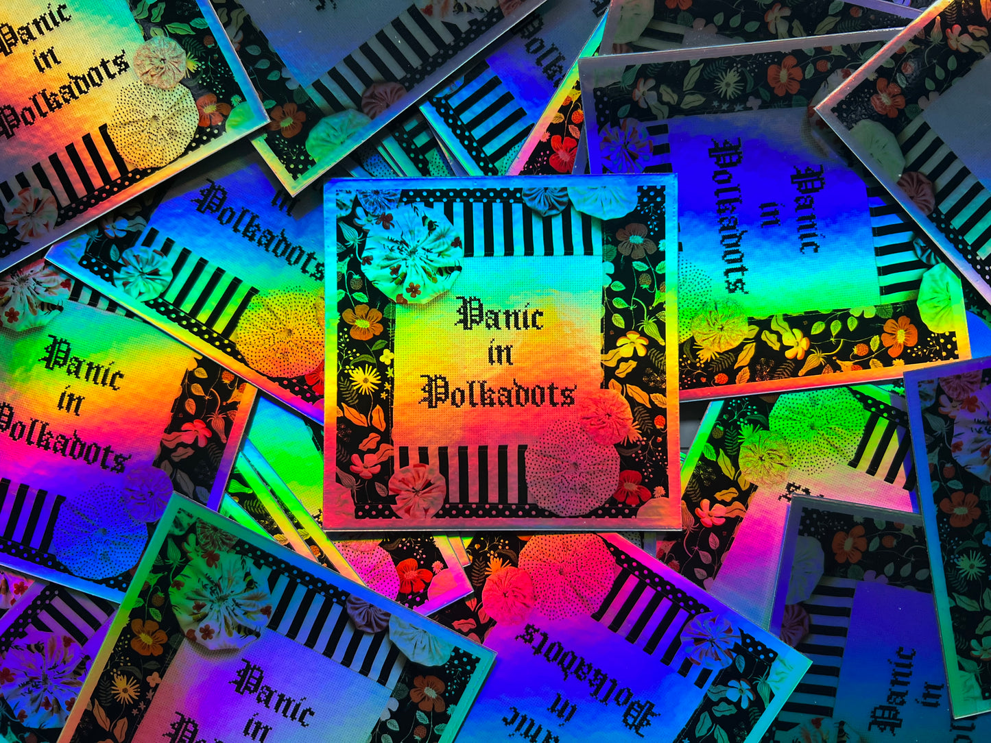 Holographic Panic in Polkadots sticker, randomized pile