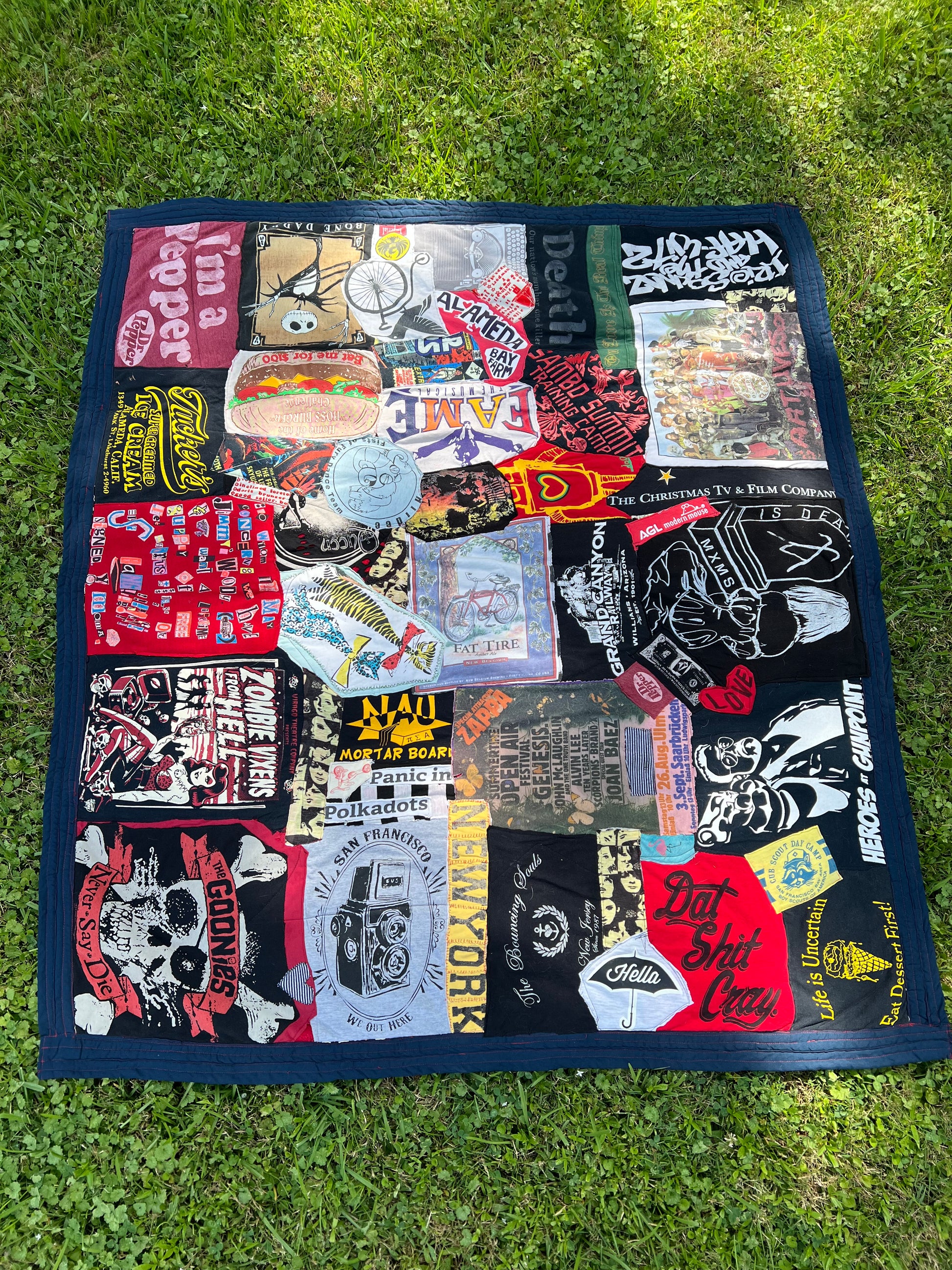 Various tshirts have been included in this tshirt quilt, such as the Goonies, Dr. Pepper, FAME (the musical), and Jack Skellington