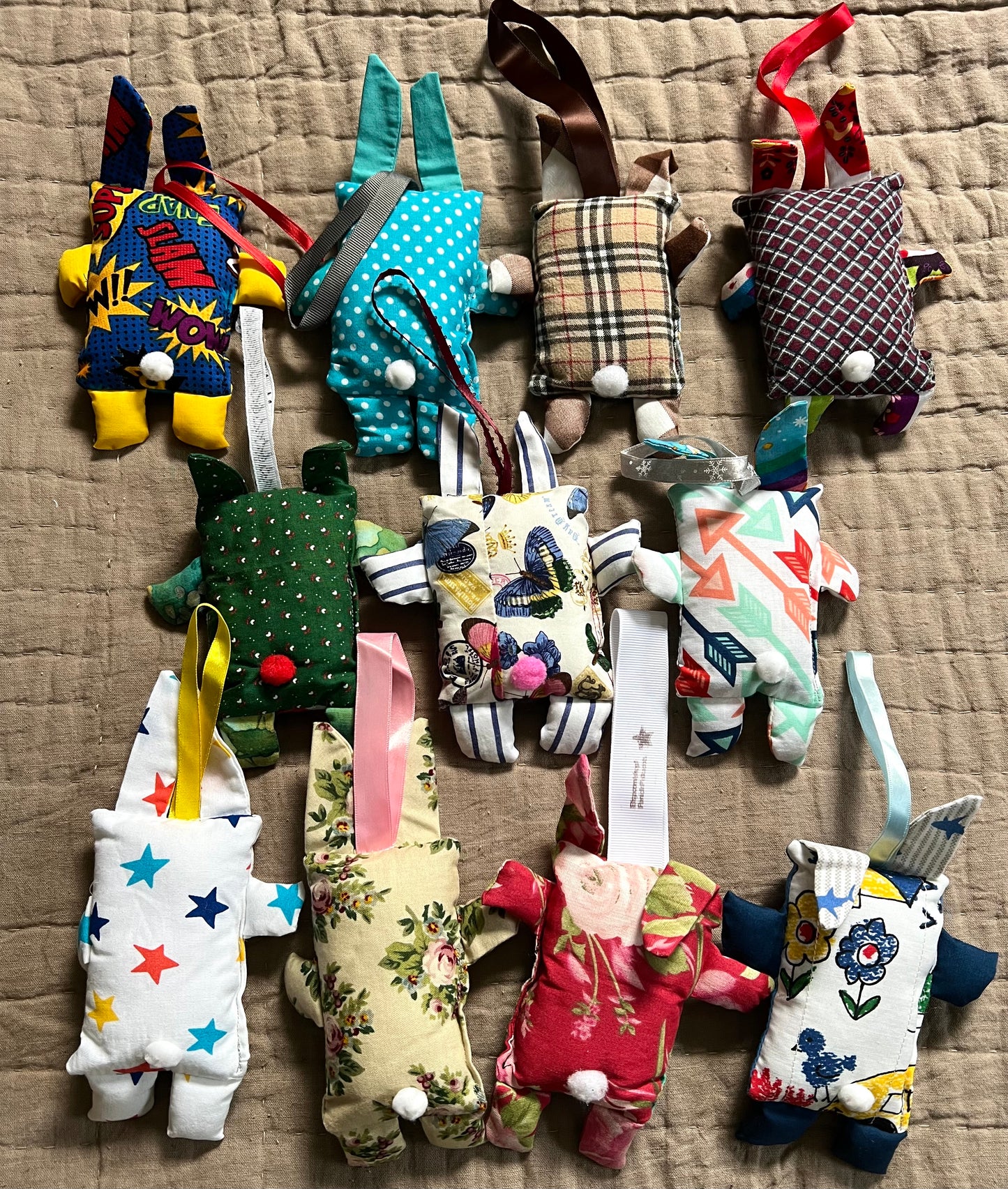 back view of mini bunny keychain ornaments, aerial view flat lay.