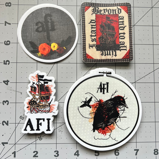 Autumn AFI sticker pack, all four stickers. AFI Sing the Sorrow, Midnight Sun, Black Sails ship, I Heard a Voice crow, aerial view against a grid background