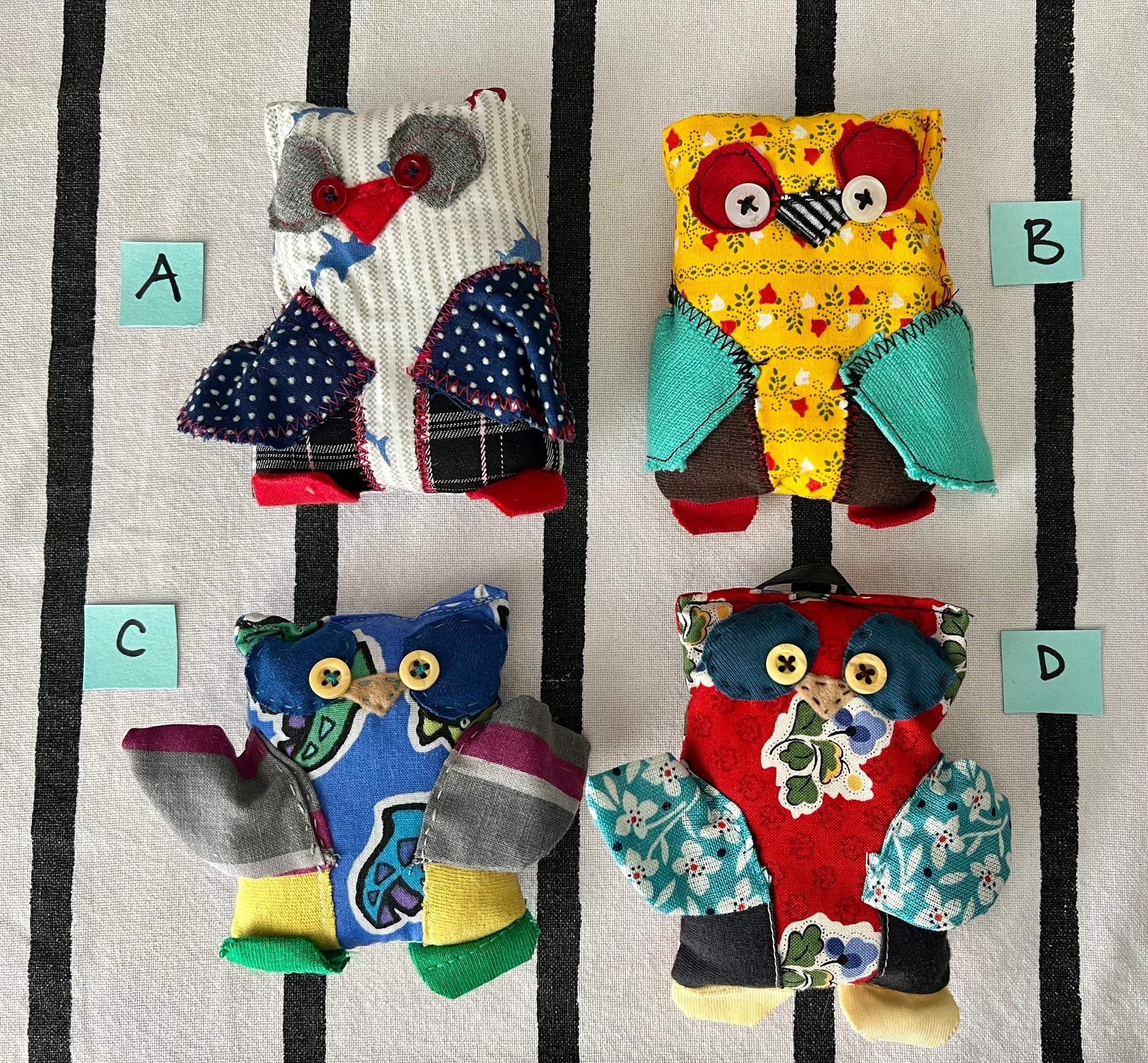 front view of mini animals with letters A B C D next to each one.