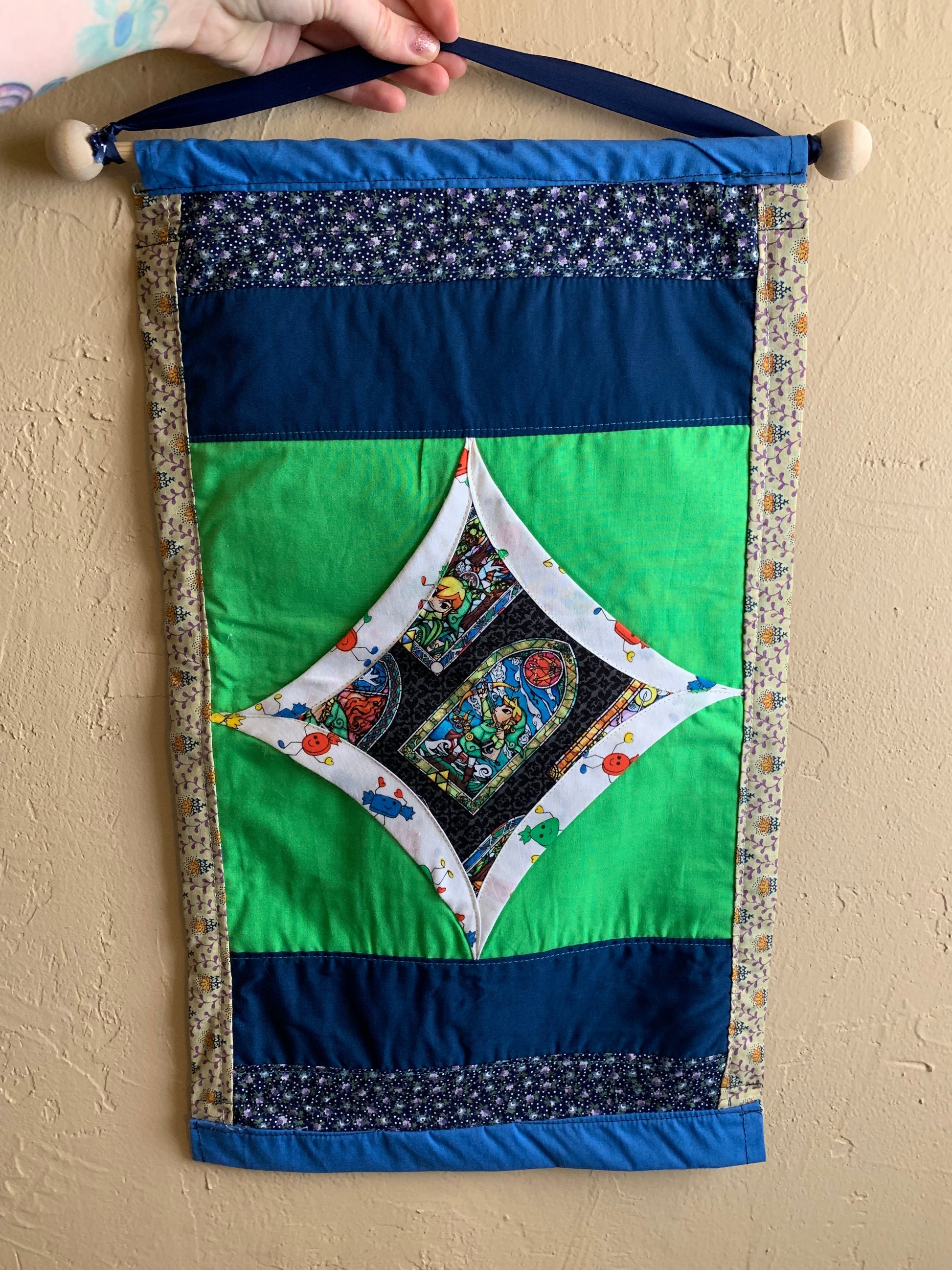 zelda wall hanging is placed against a wall