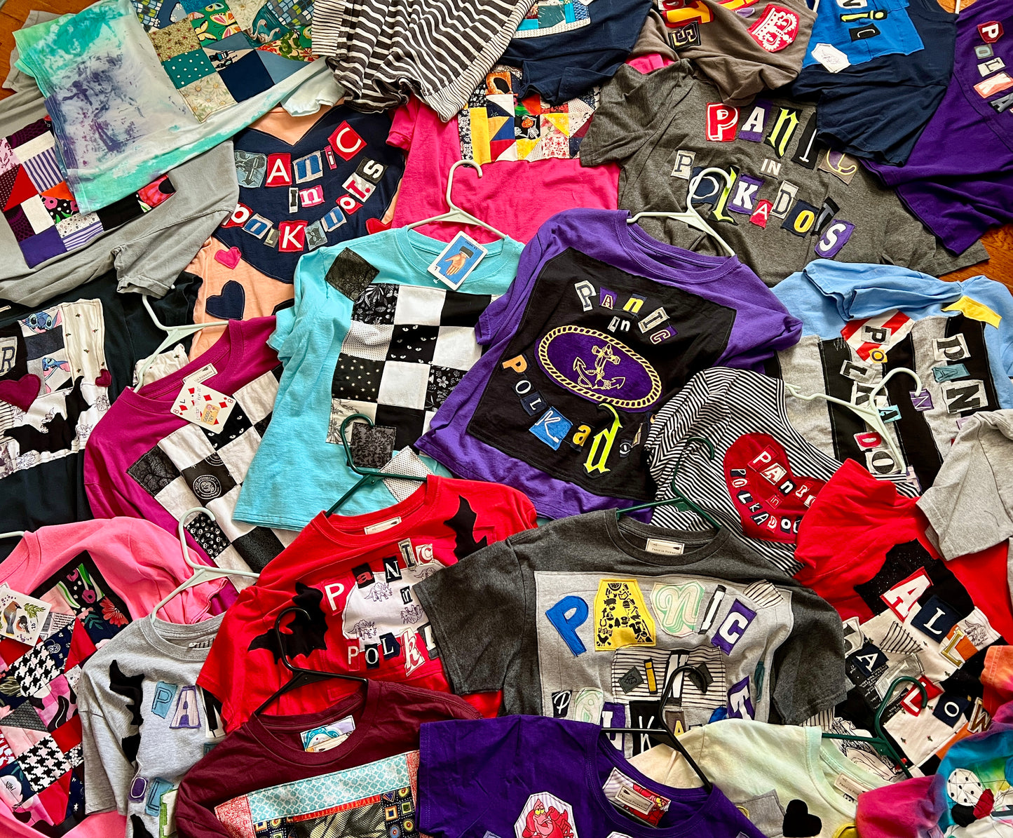 Tshirts with quilty designs, in an array
