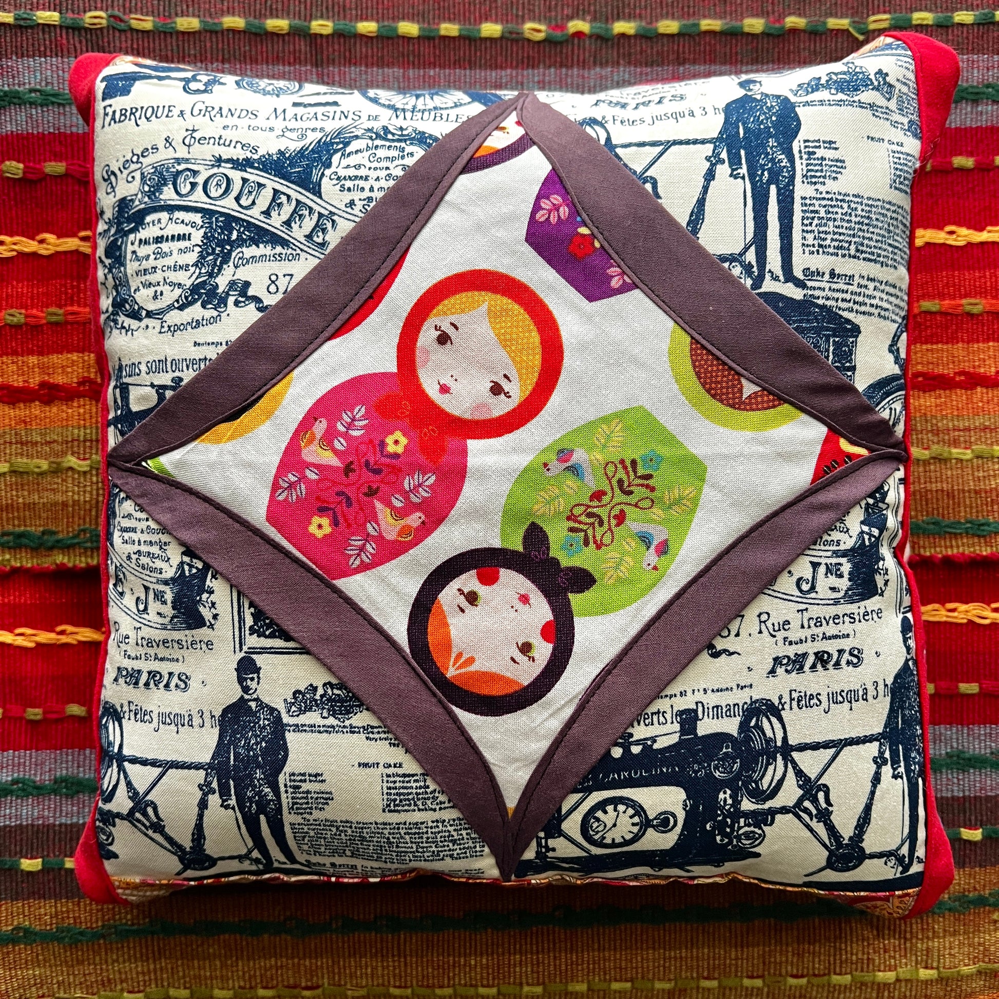 matryoshka little pillow, lay flat against a colorful background