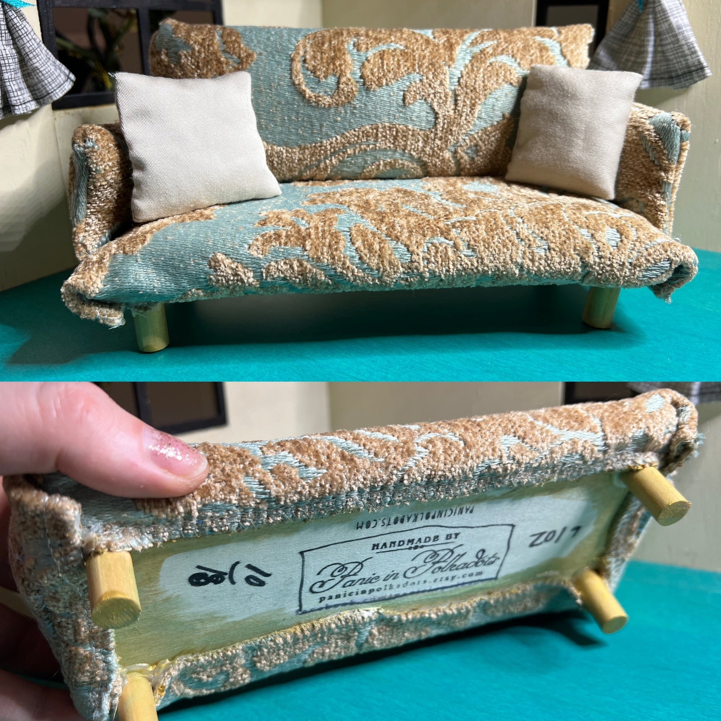 a miniature dollhouse couch, top picture is front view, bottom picture shows underside of couch with item number, year created, and "Panic in Polkadots" stamp on underside