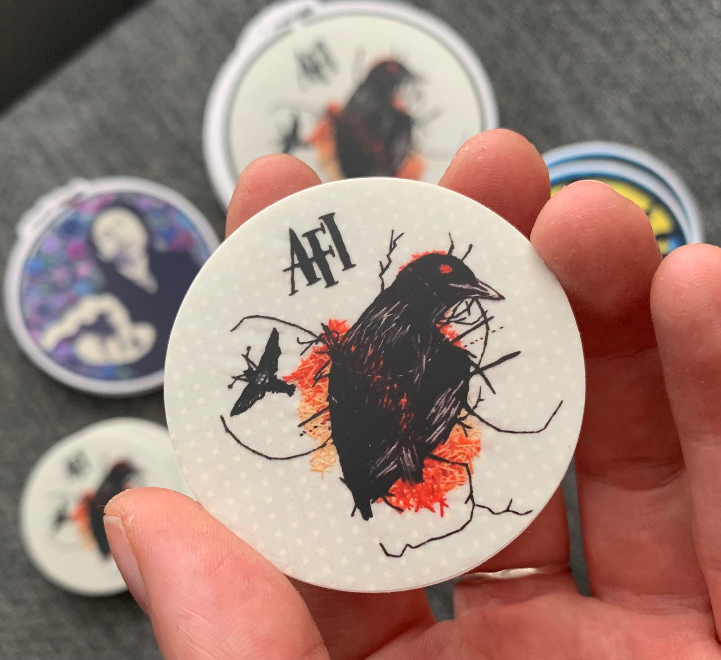 AFI crow design from "I heard a voice" which has been embroidered by me, and then turned into a sticker