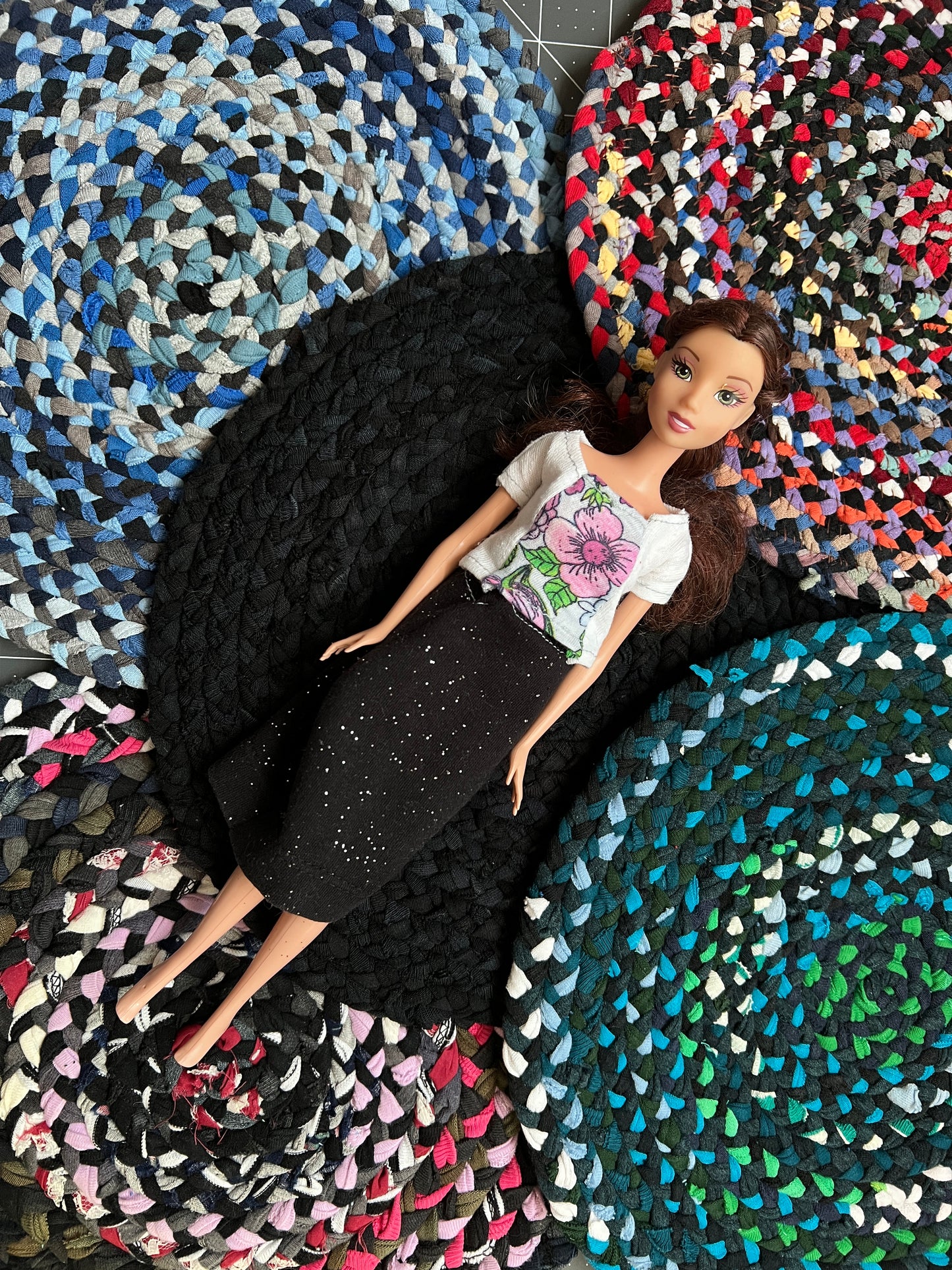 Barbie doll lays on top of 11" miniature dollhouse rugs, they would be perfect in a Barbie Dreamhouse!