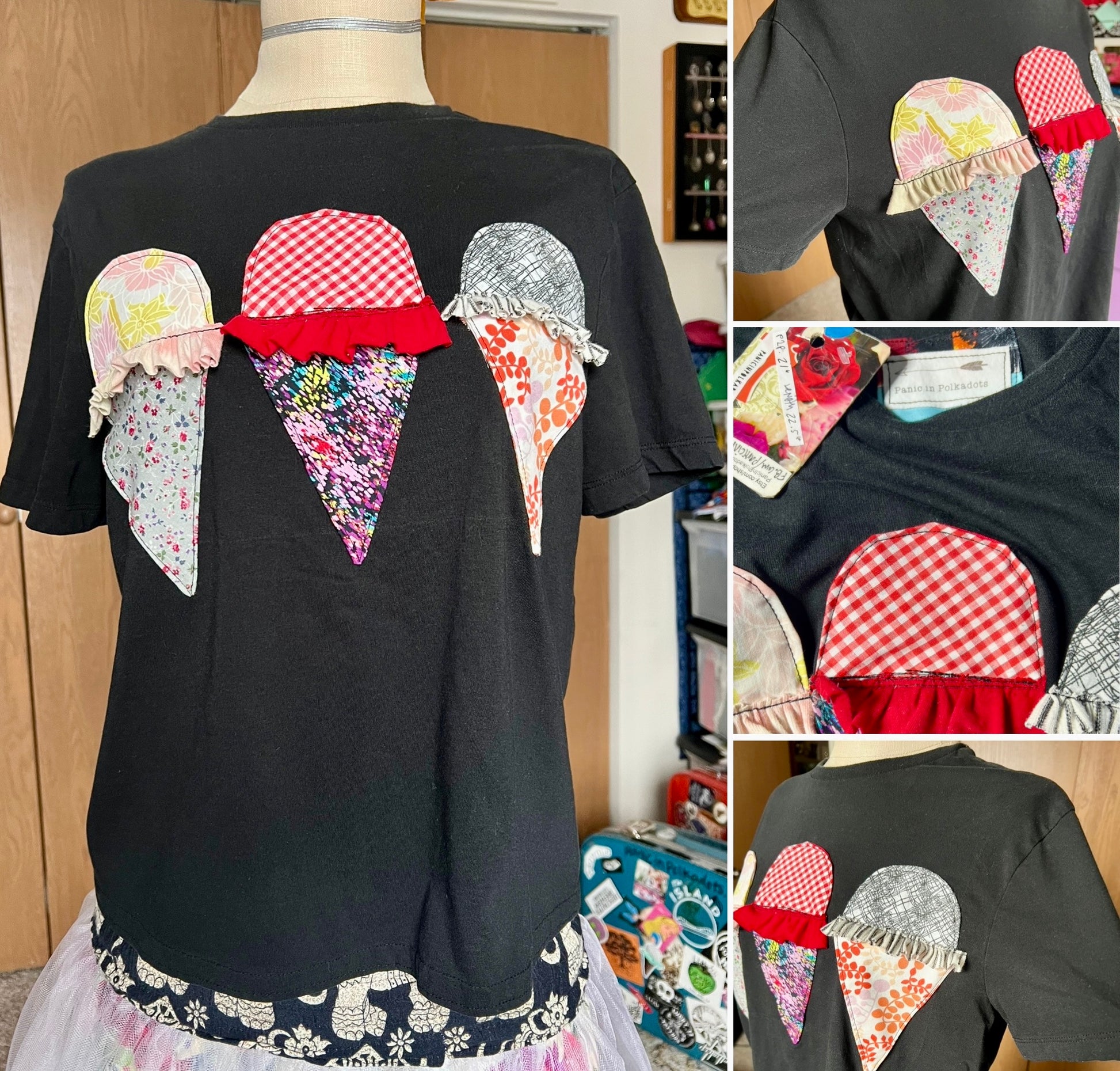 Black t-shirt with colorful ice cream cone designs on a mannequin.