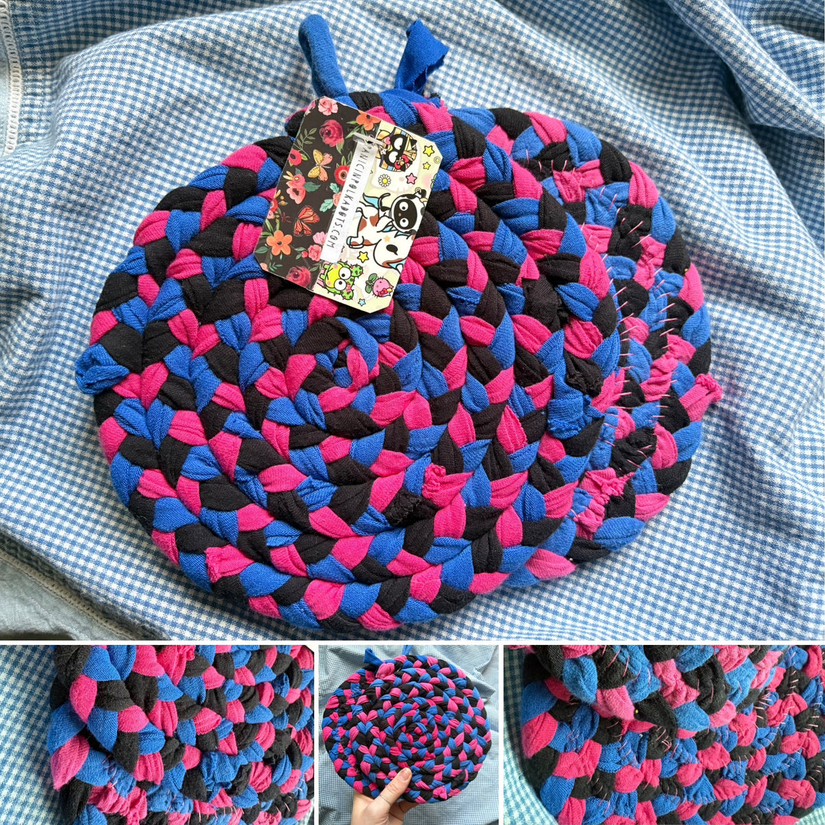 A round braided trivet made from pink, blue, and black fabric strips, shown on a blue-and-white gingham blanket with a hanging product tag. Three smaller inset images at the bottom show close-up detail views of the braided texture and the round shape, including a hand holding it in one inset.