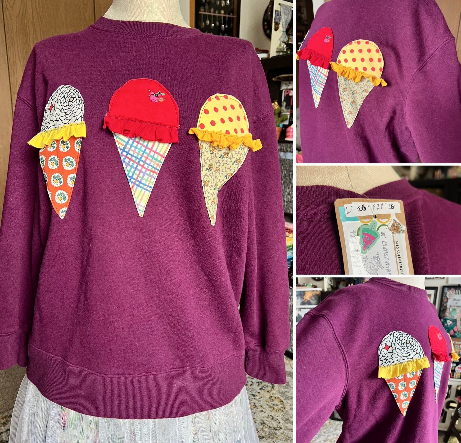 Magenta sweatshirt with ice cream cone designs on the front chest, displayed on a mannequin.