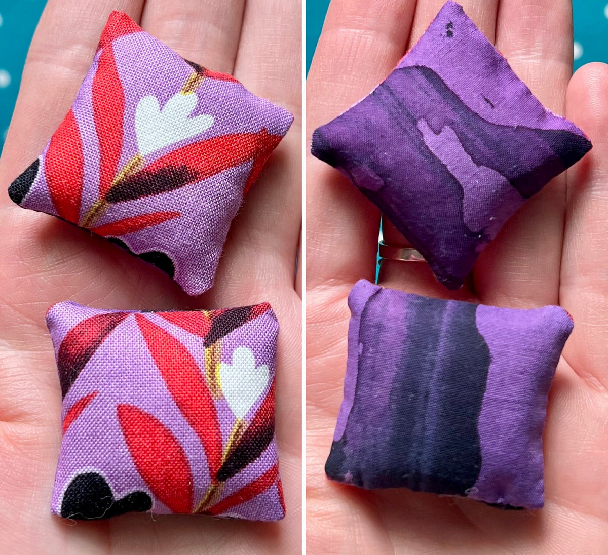 Two small fabric pillows with colorful patterns held in hands against a blue background.