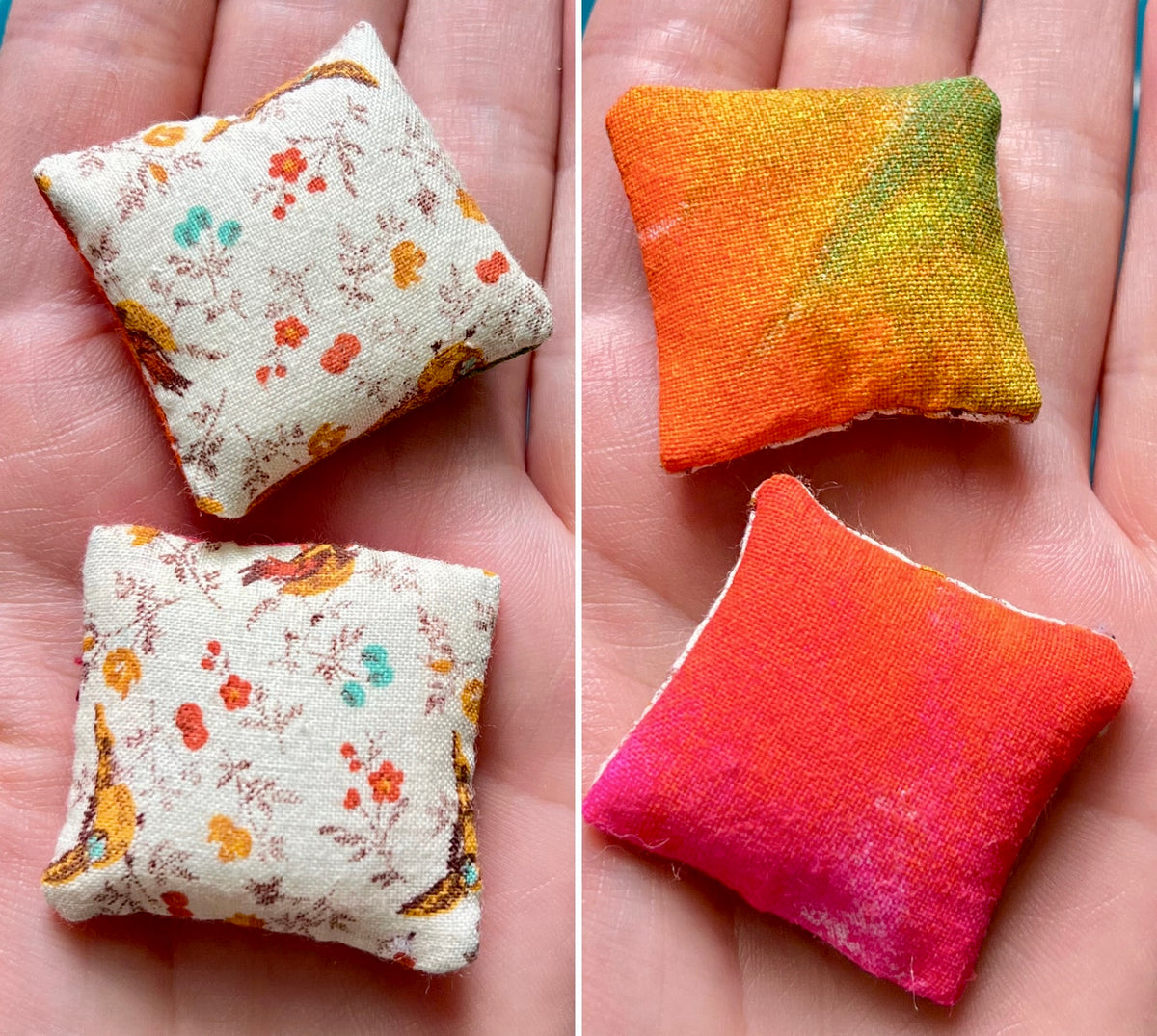 Two tiny fabric pillows with different patterns front and back views held in hands.
