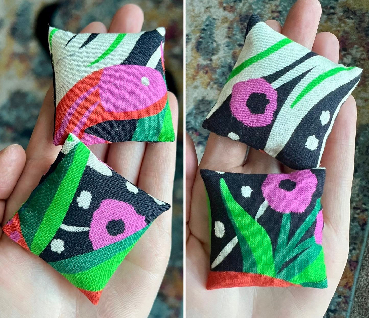 Two doll fabric pillows with colorful patterns held in a hand.
