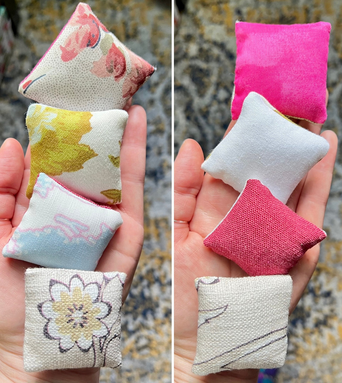Small fabric pillows in various colors held in a hand against a patterned background
