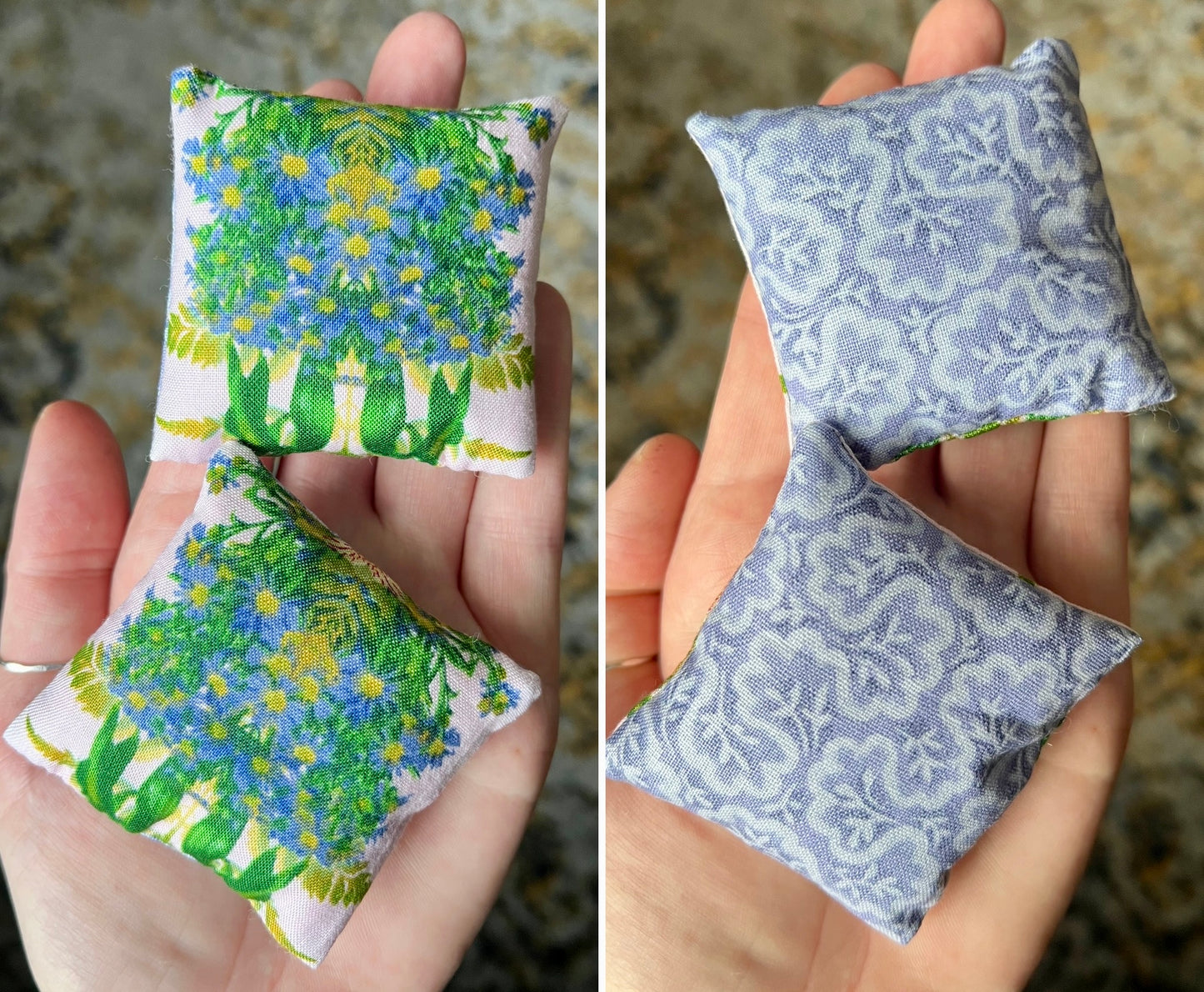Two small fabric pillows with floral and paisley patterns held in hands.