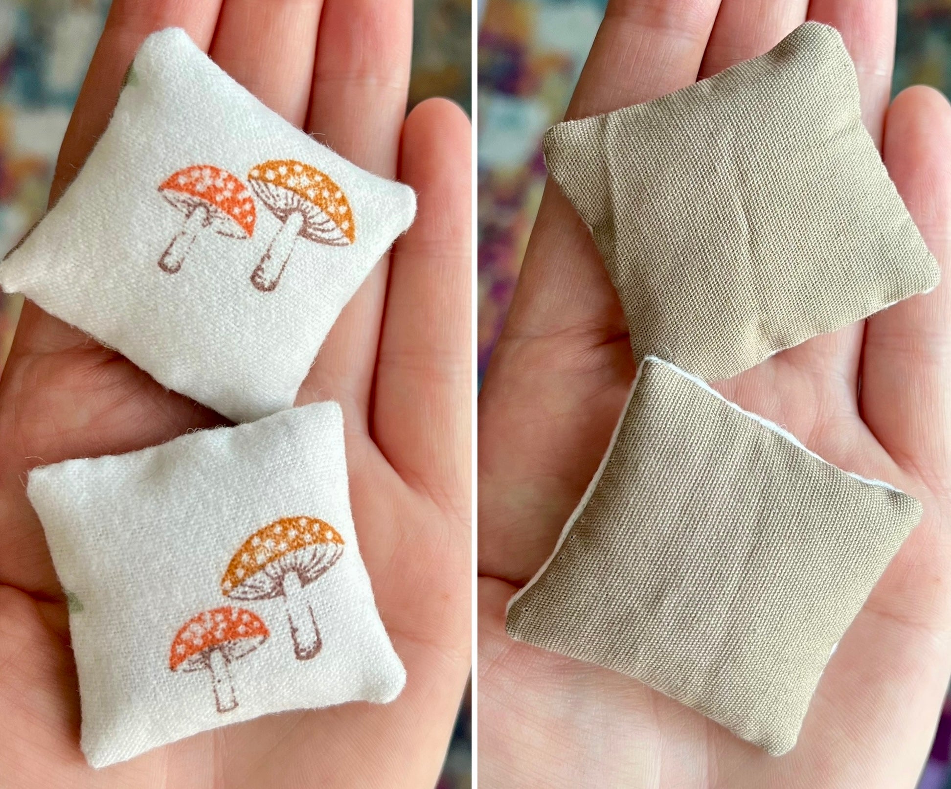 Two small fabric pillows held in hands, the front is with mushrooms on a white background and the back is tan.
