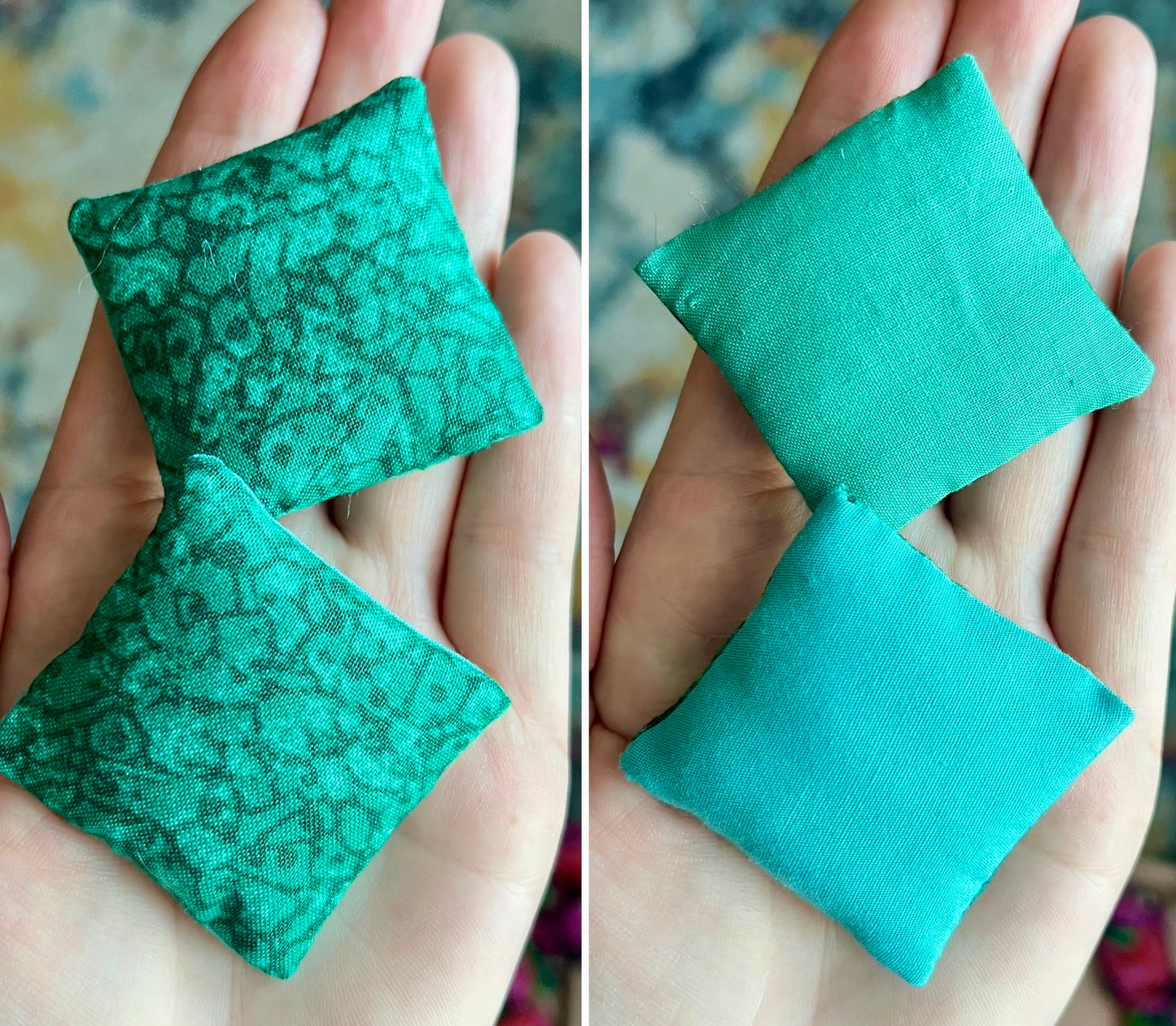 Two green fabric pillows held in hands, front with a textured pattern and the back a solid color.