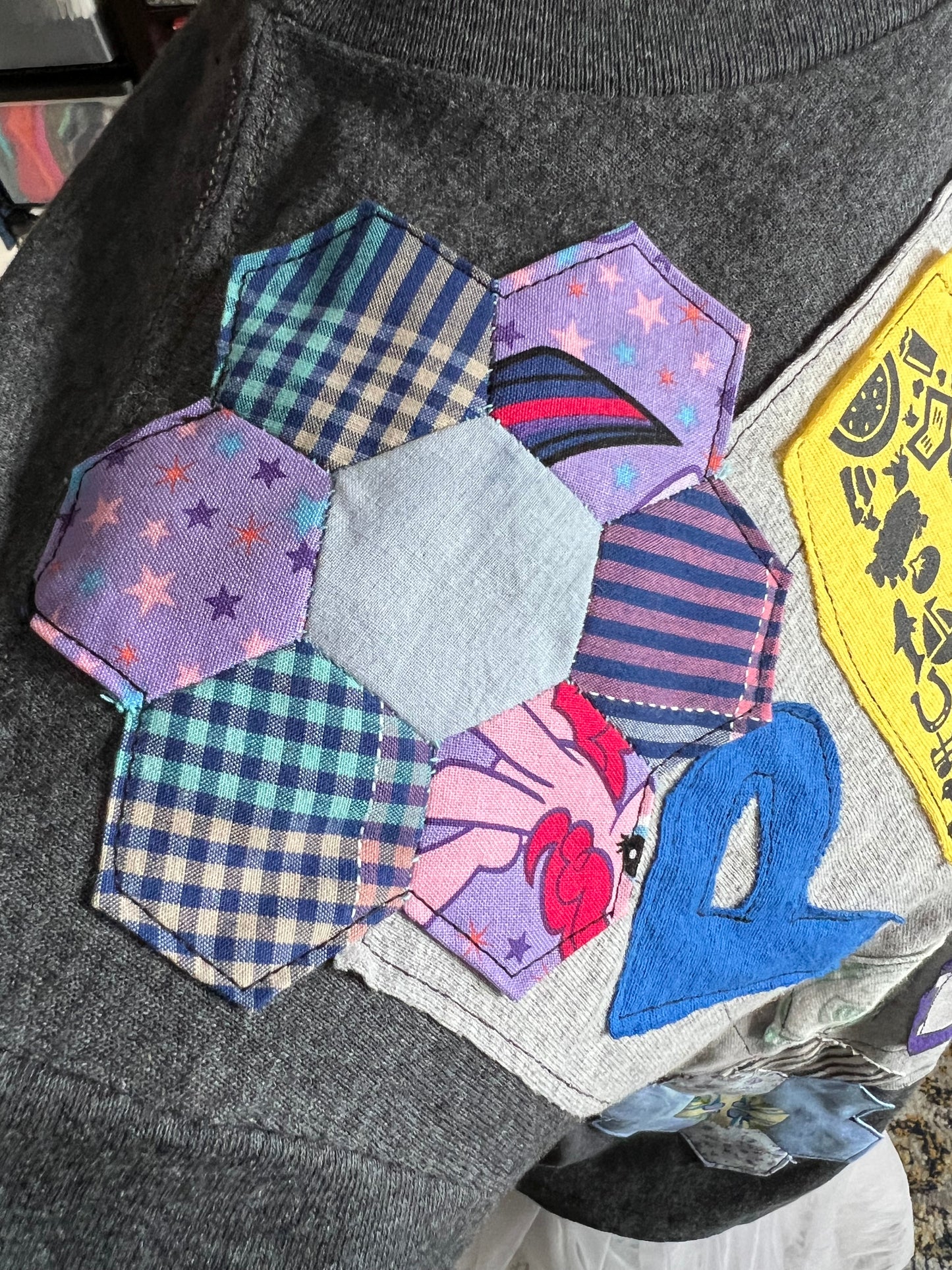 Hexagonal patchwork design on a tee shirt 