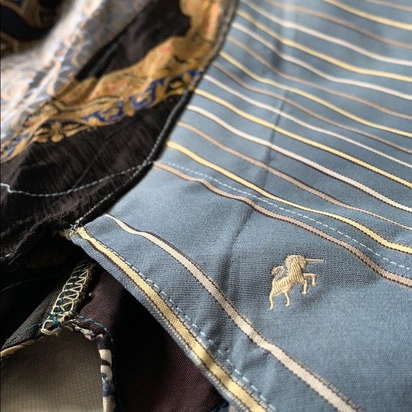 Blue and gold necktie skirt, closeup of unicorn detail on necktie