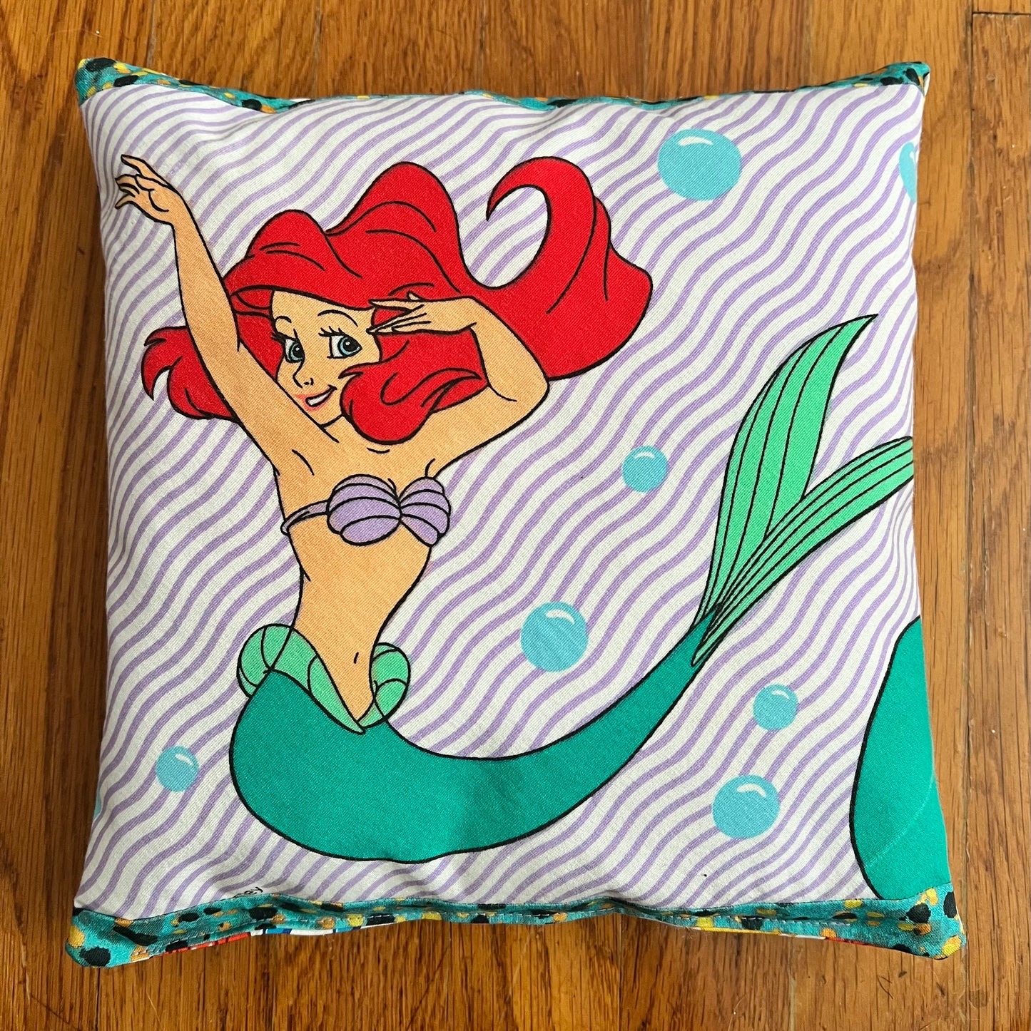 A little accent pillow, with Ariel from The Little Mermaid, original art from a vintage sheet