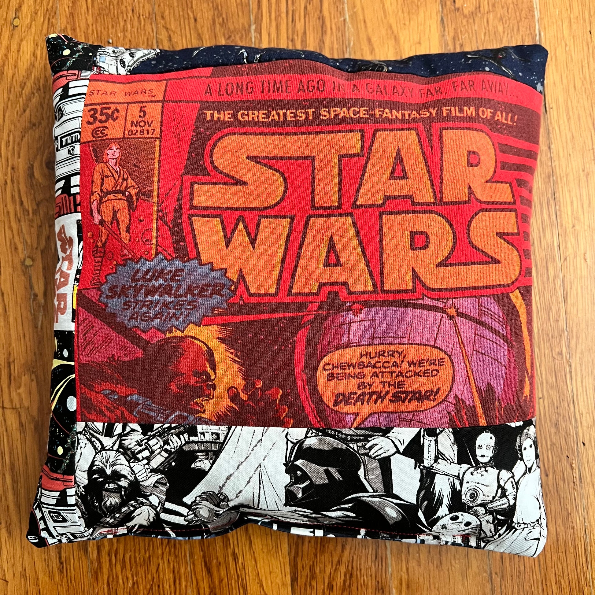 A little accent pillow. Star wars  comic on a red tshirt, with cotton star warss collage print fabric around edges