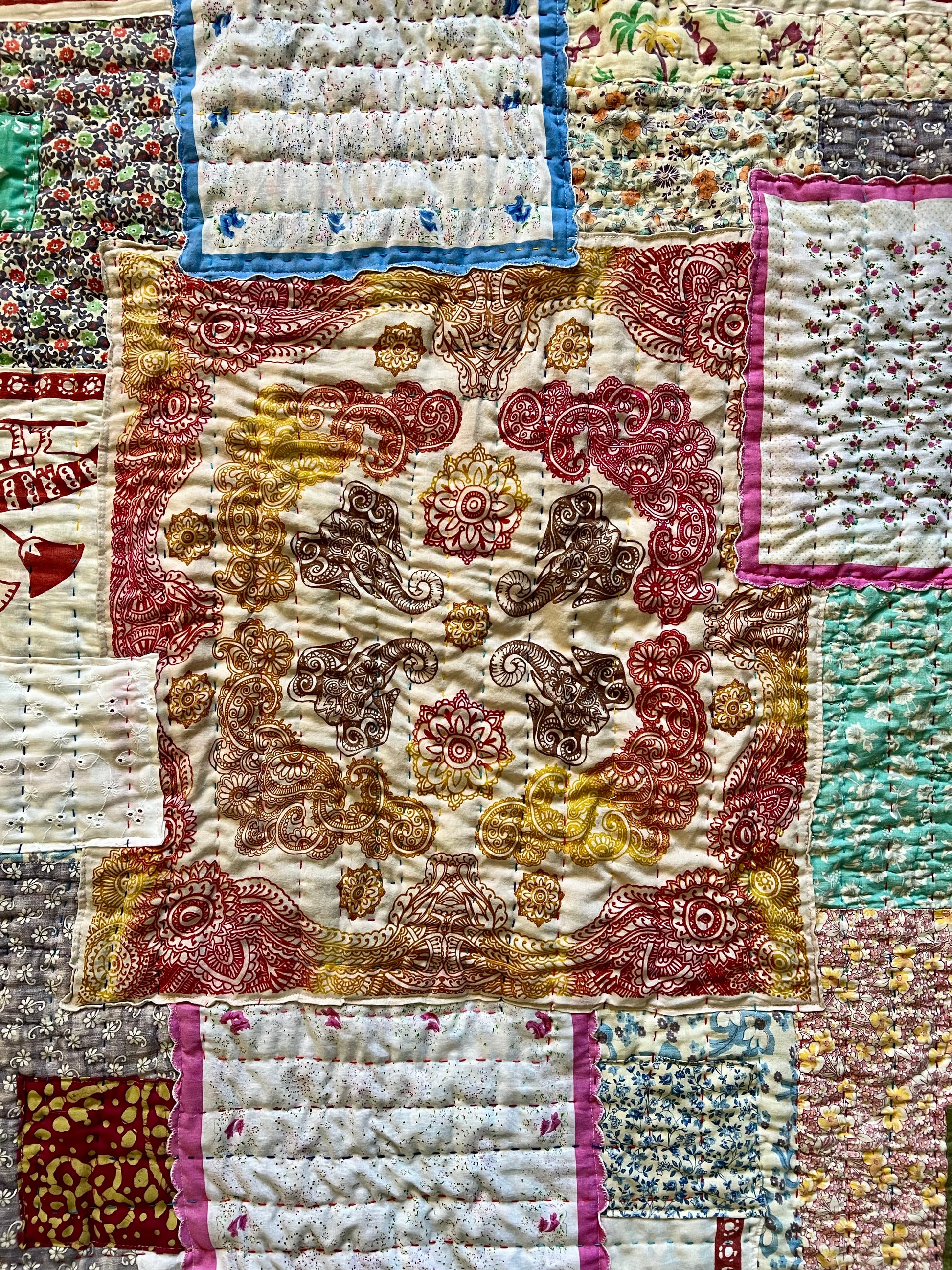 another closeup view of this hand sewn quilt, which is extra crinkly