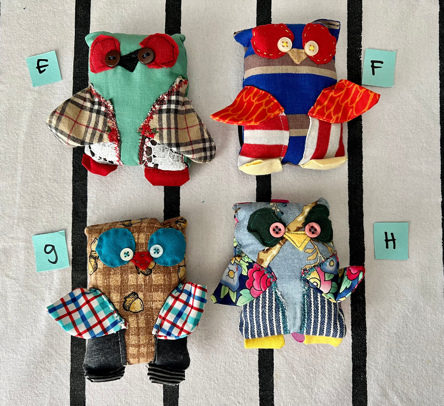 front view of mini animals with letters E F G H next to each one.