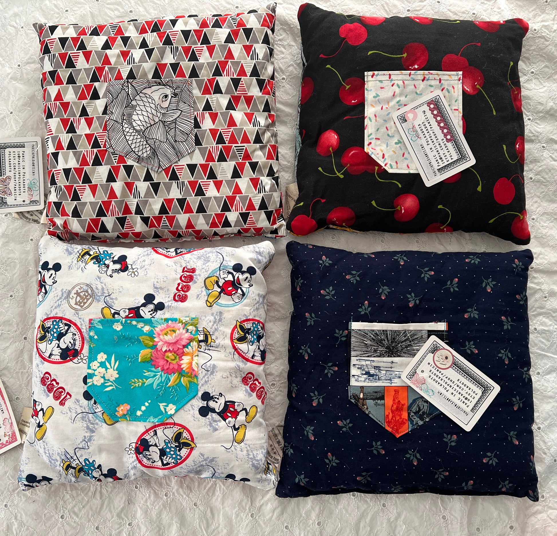 A group of little pillows, showing the back pocket for tooth fairy collection