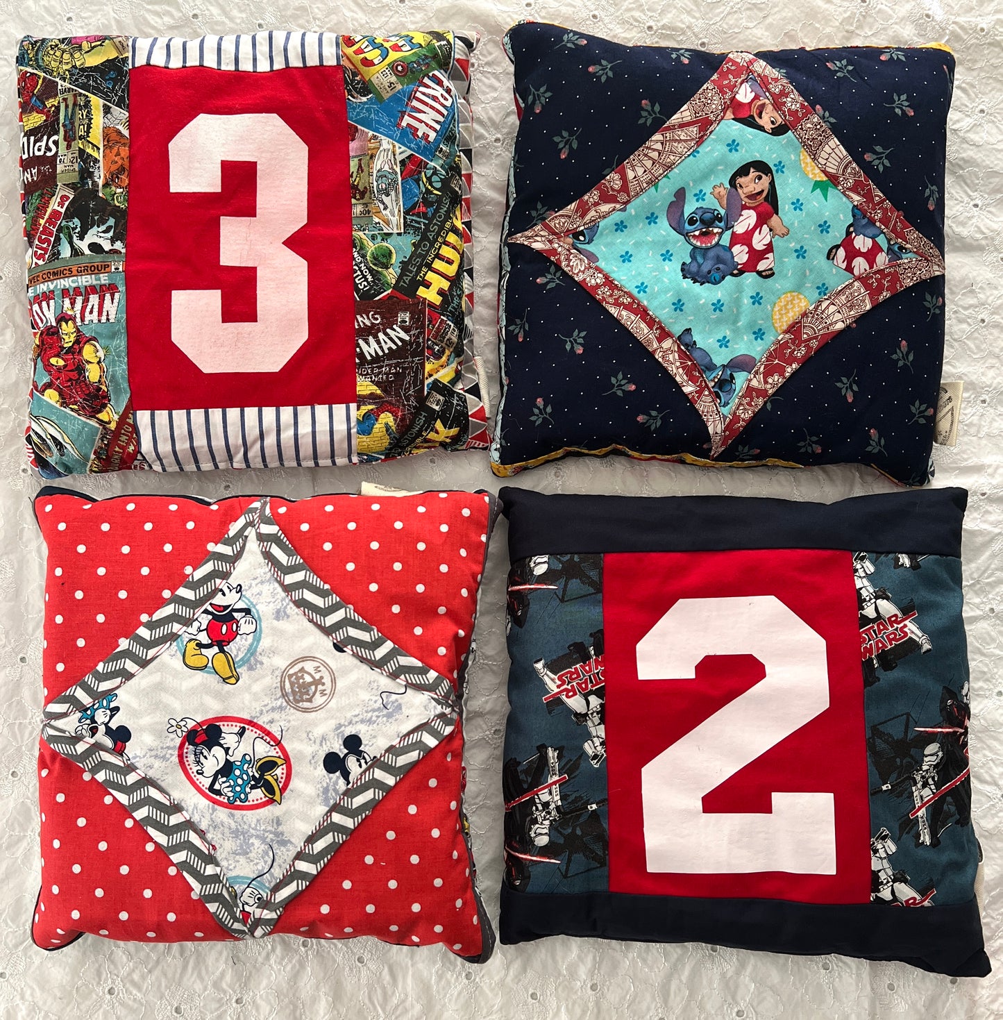 A group of little pillows aerial view Mickey Mouse Lilo & Stitch number two, number three
