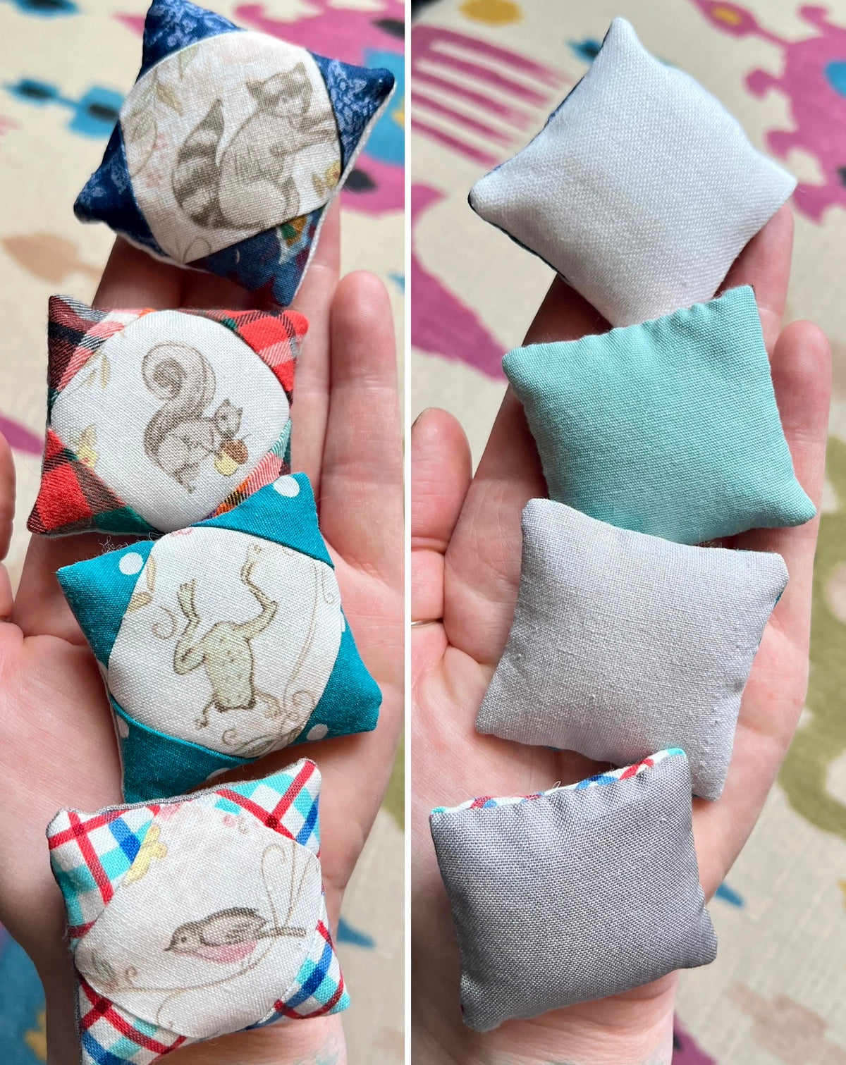 Small fabric pillows held in hands with various patterns and colors.