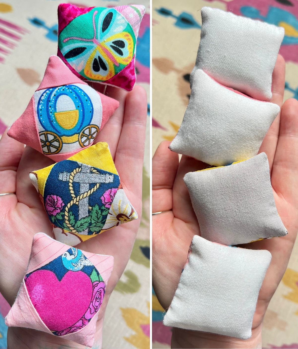 Colorful fabric tiny doll pillows with decorative patterns held in a hand, next to plain white pillows.
