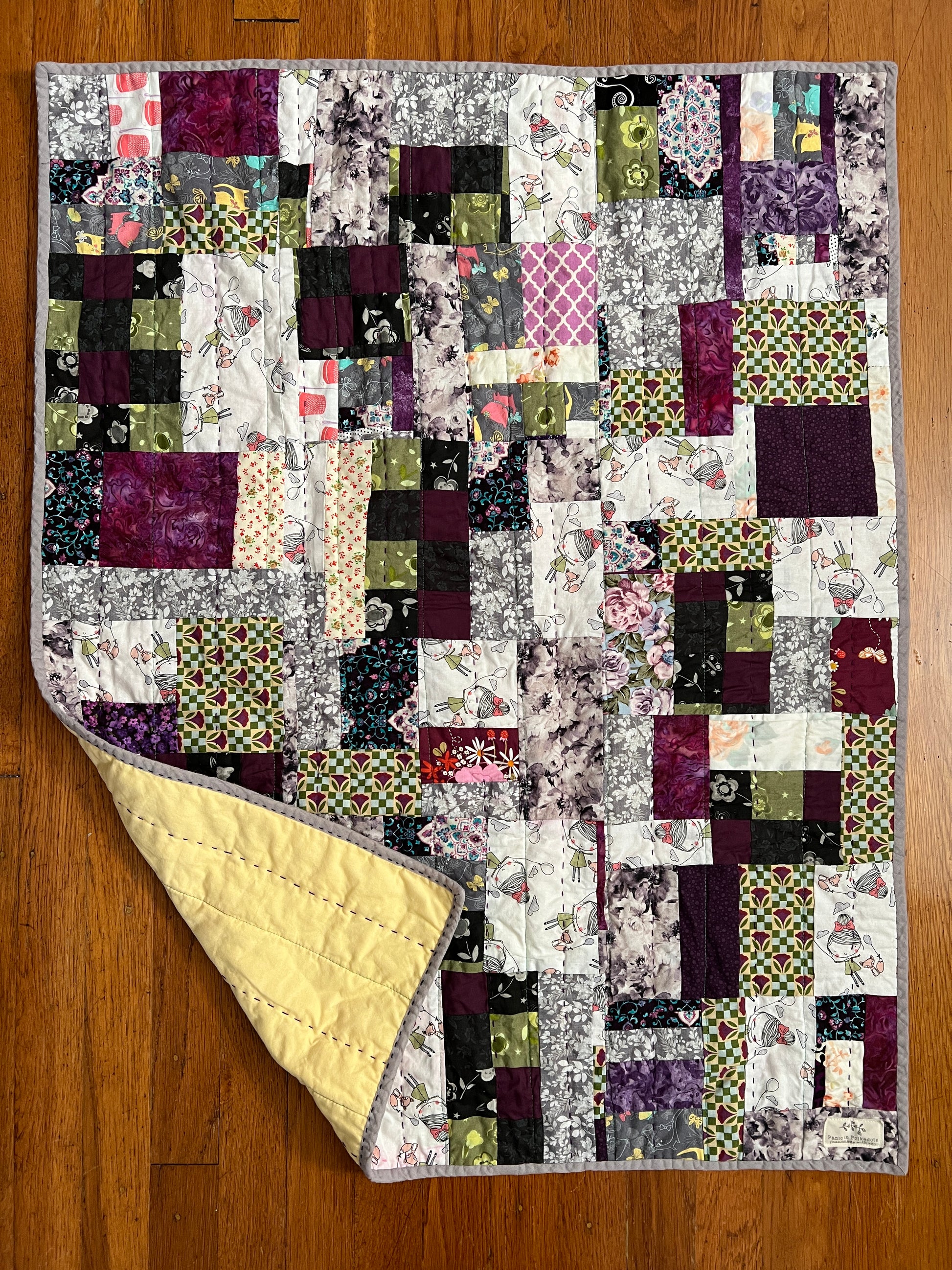 Pet/baby quilt With purples and girl
