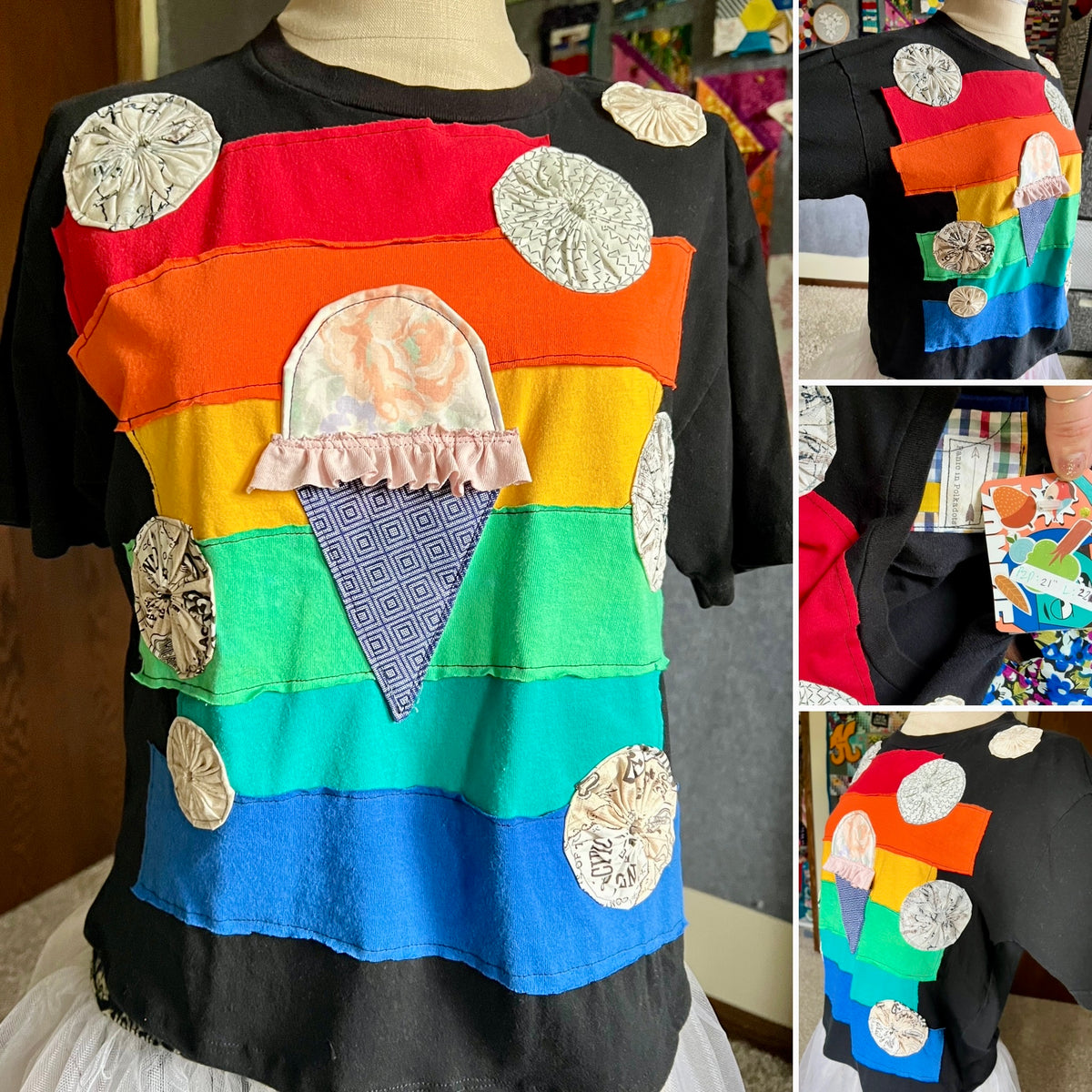 A black short-sleeve T-shirt displayed on a mannequin torso, decorated with bold horizontal rainbow fabric stripes, circular metallic shell embellishments, and a central ice cream cone patch. The main view is on the left, with three smaller inset views on the right showing the shirt from different angles and a hand holding a small accessory.