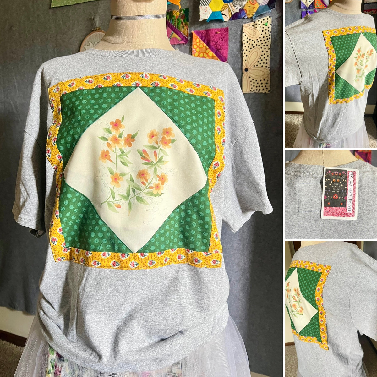 A heather gray short-sleeve T-shirt displayed on a mannequin, showing a large decorative patchwork-style back panel with a cream diamond center printed with orange flowers, green dotted border sections, and yellow floral trim. Smaller inset views on the right show additional angles of the shirt and a hangtag.