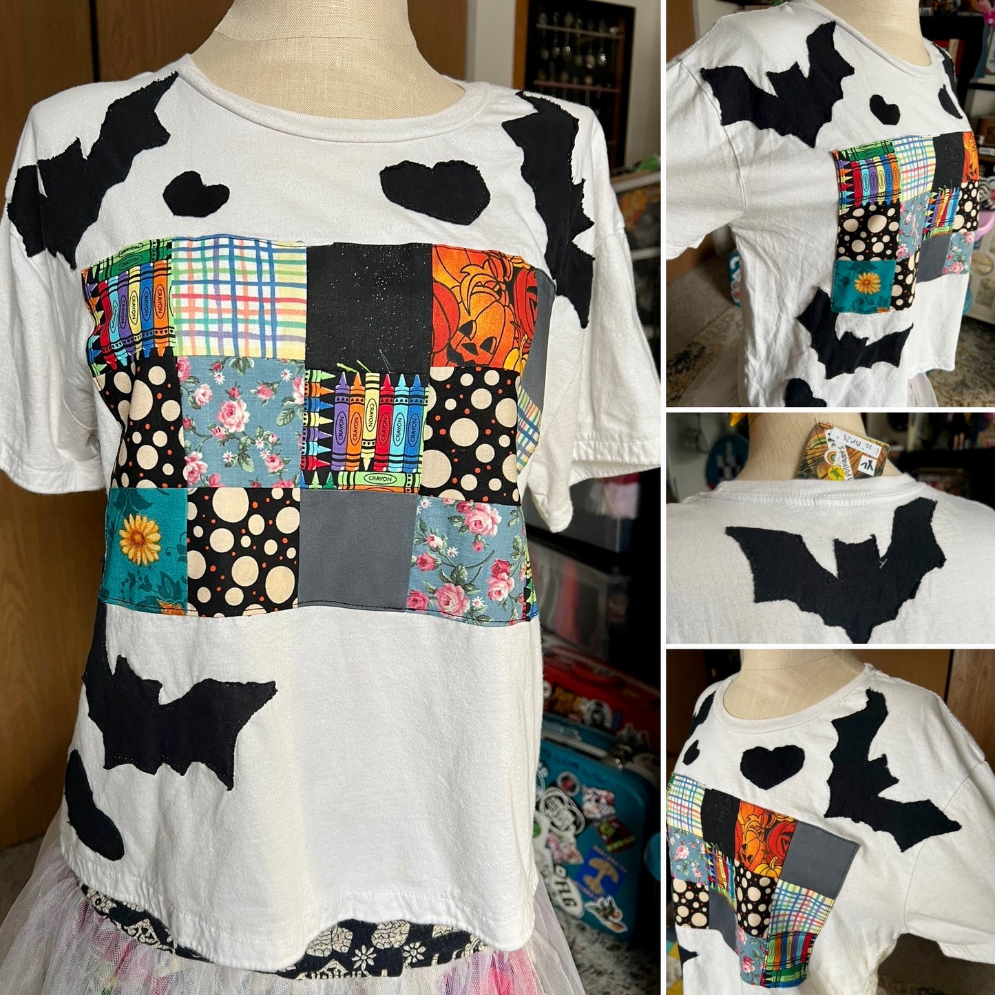 Collage of a white shirt with colorful patchwork design and bat shapes.