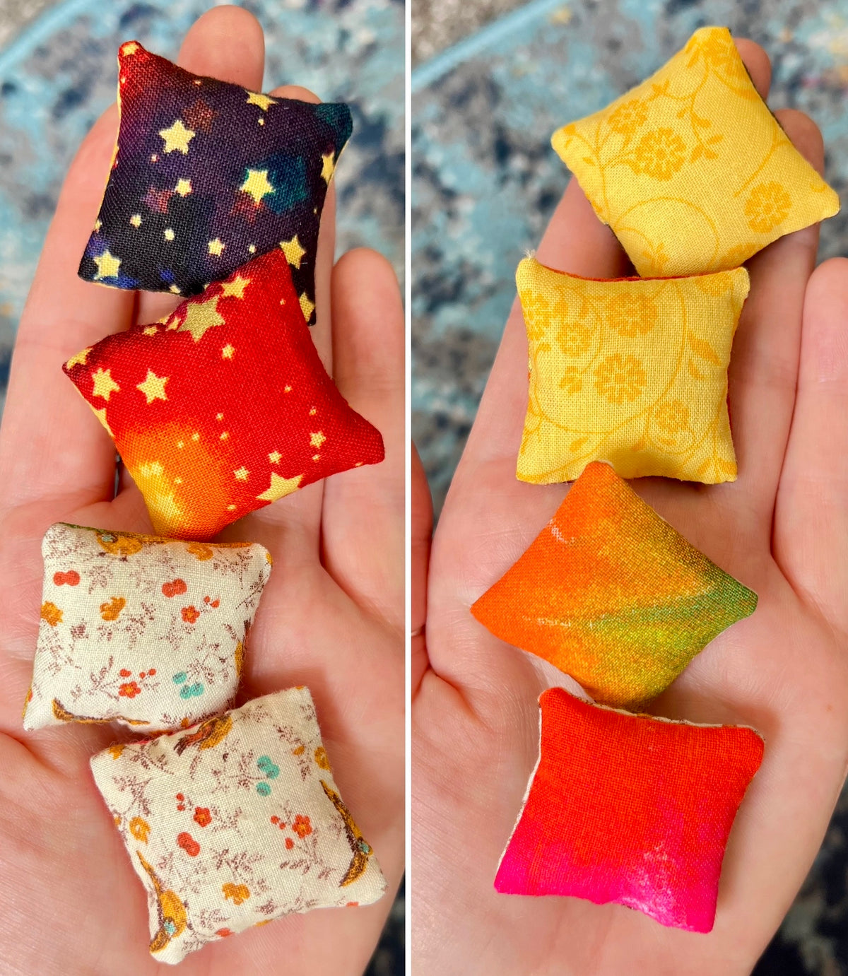 Colorful fabric pillows held in hands against a neutral background