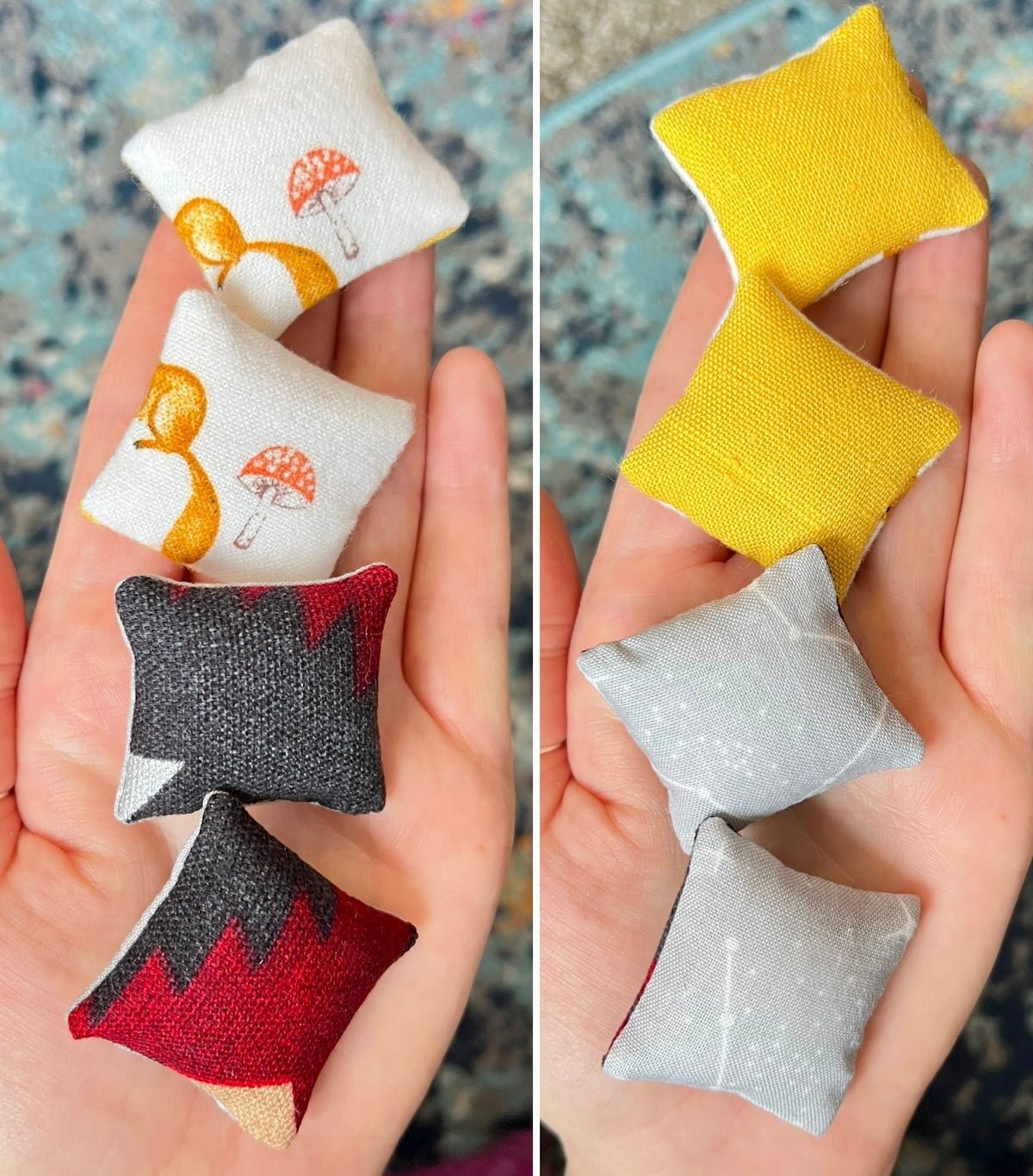 Small fabric pillows in various colors held in hands against a textured background