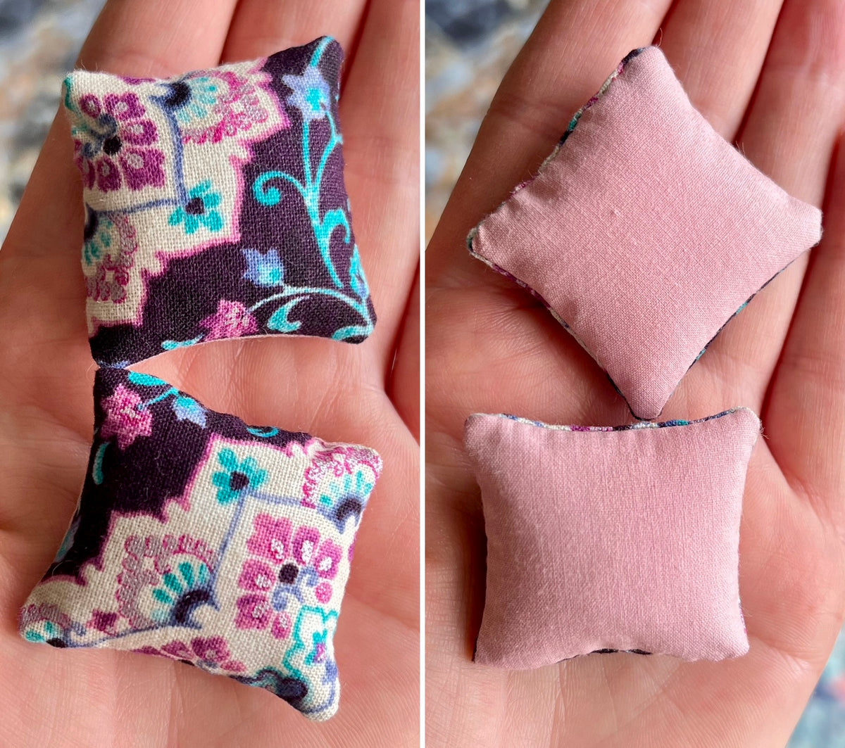 Two small fabric pillows, front with floral pattern and back plain pink, held in hands.