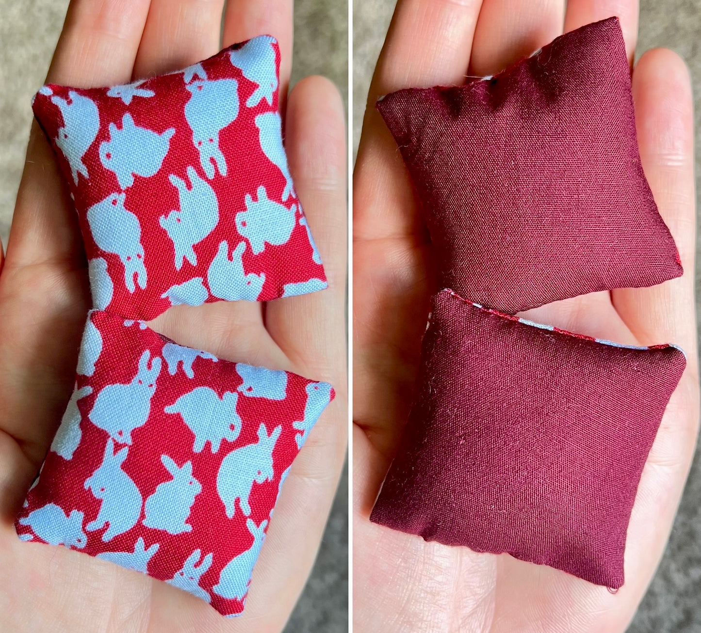 Two fabric doll pillows held in hands, front with rabbit pattern on red and white, the back is solid burgundy.