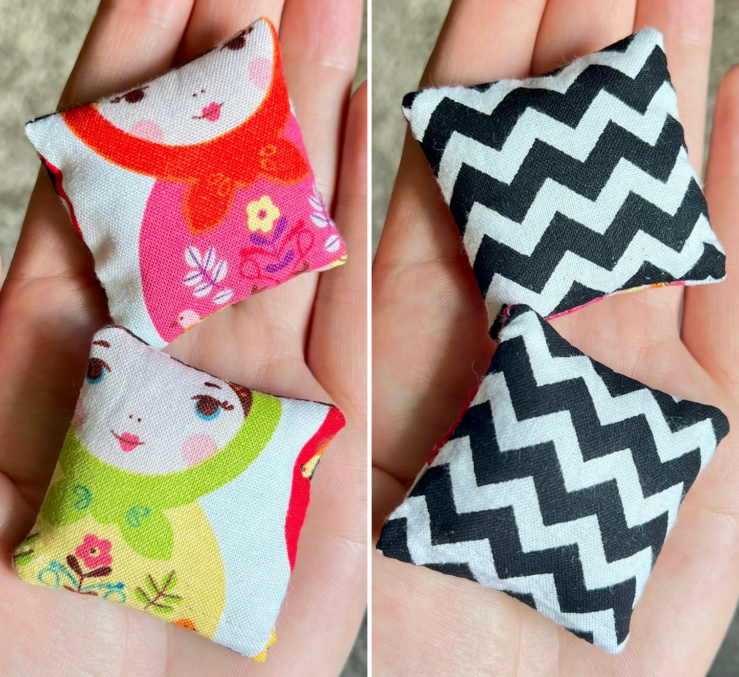 Two small fabric pillows, front is a matryoshka doll fabric, and back is black and white chevron, held in hands.