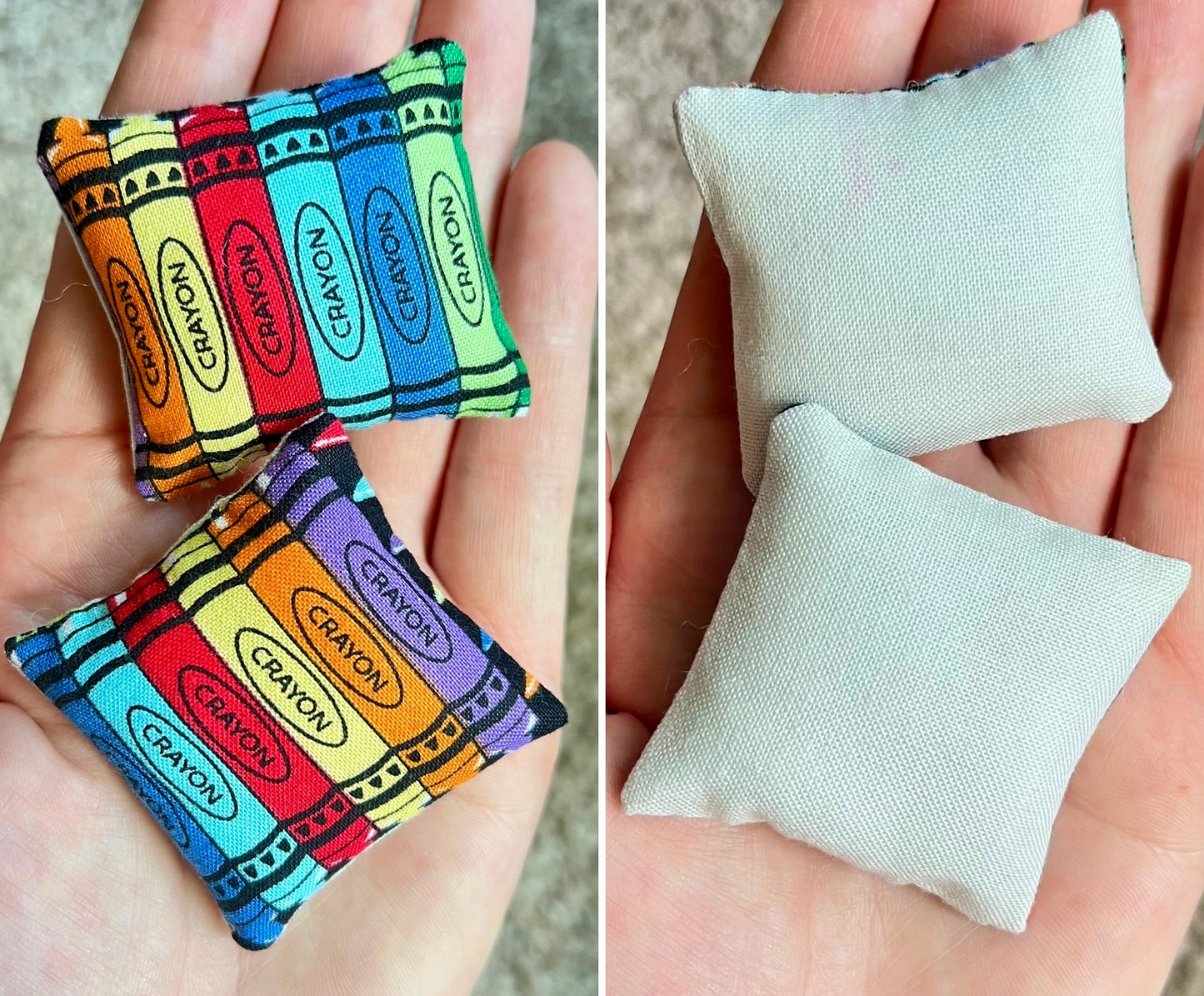 Colorful crayon print pillows with light mint back held in hands.