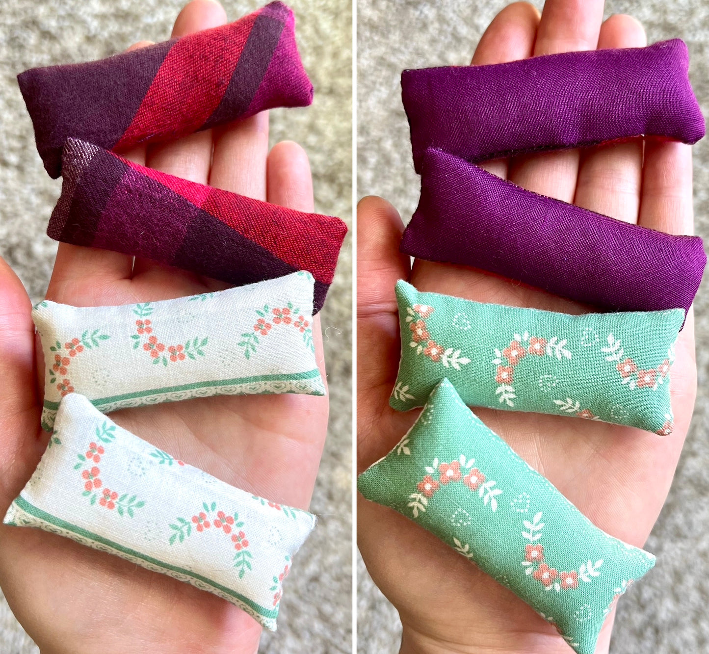 Two pairs of oblong Small fabric pillows in various colors held in a hand on a neutral background