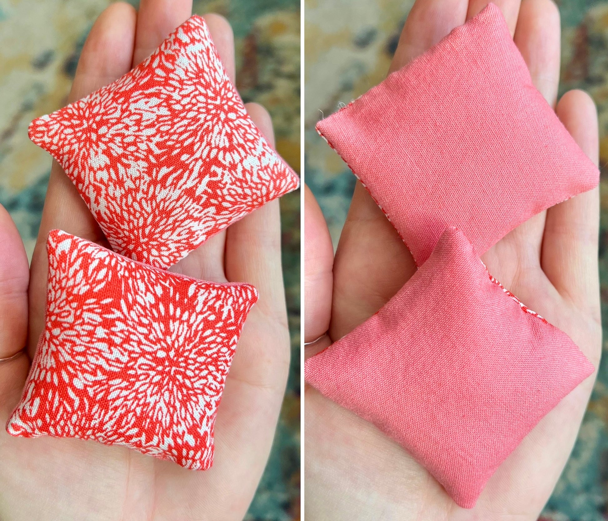 Two small fabric pillows, the front is a salmon and white pattern and the back solid pink, held in hands against a blurred background.
