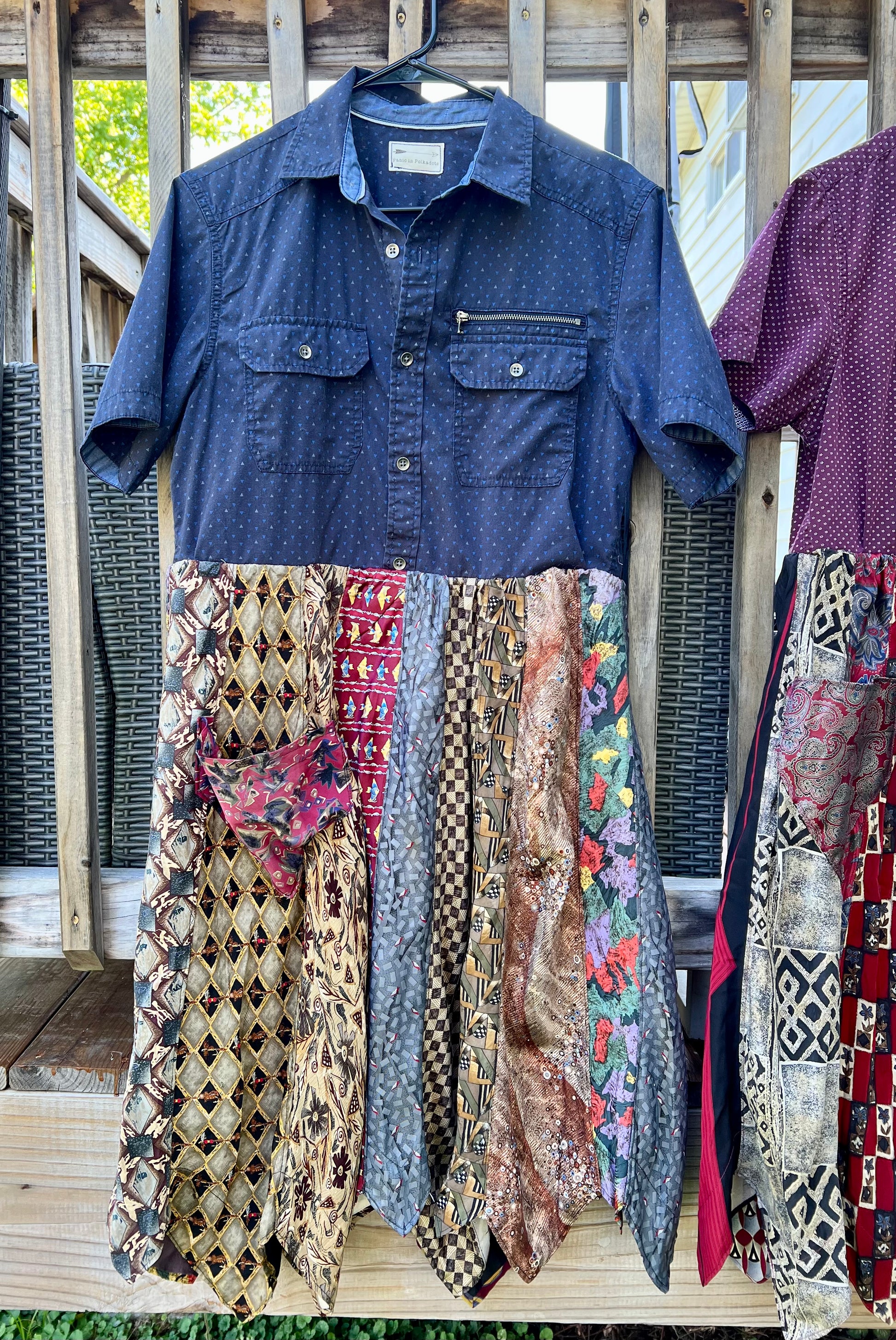 navy necktie shirtdress, hung up outside for good lighting