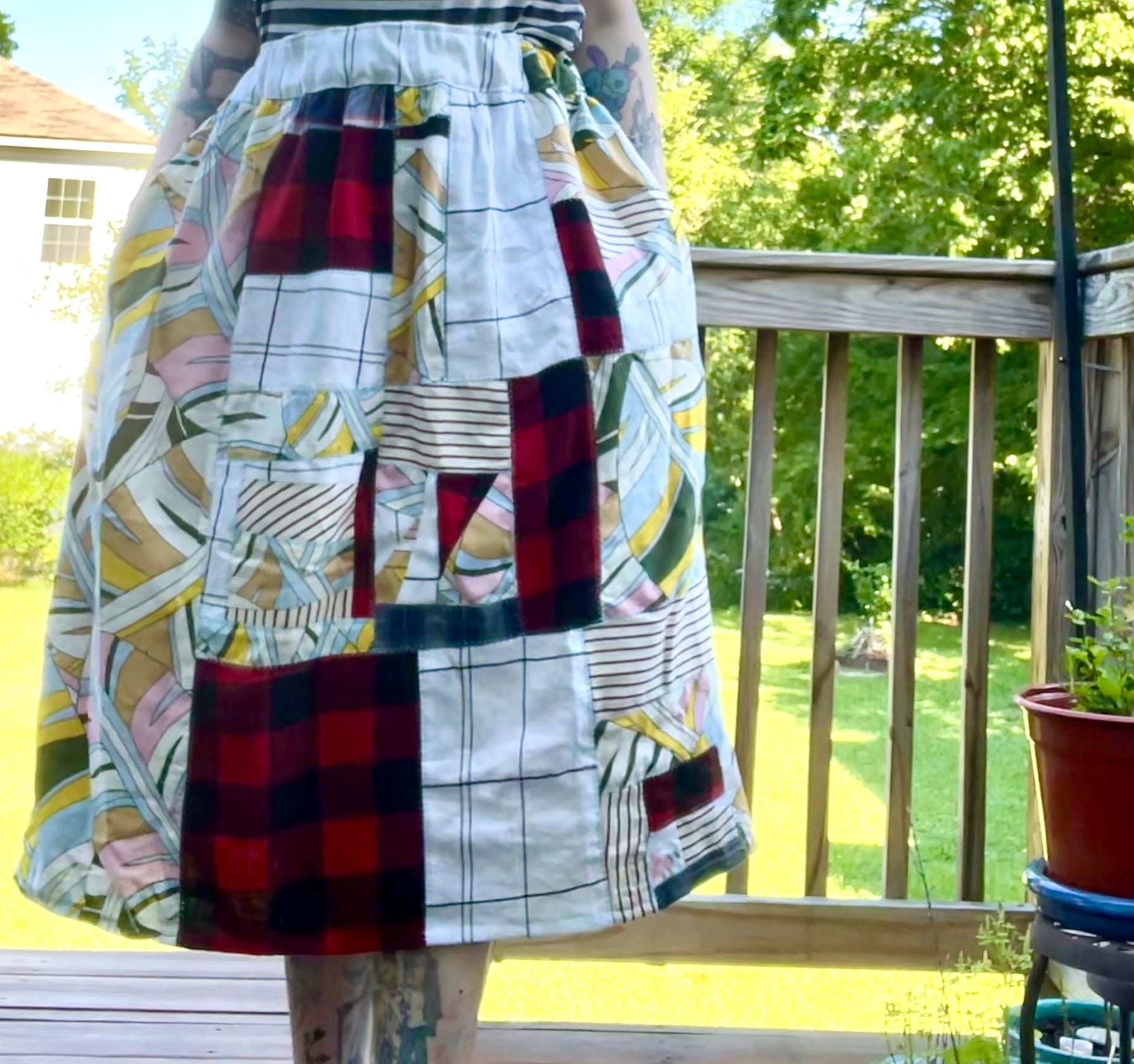Patchwork skirt, plaids and leaves, vibrant fall skirt, worn outside by a tattooed model