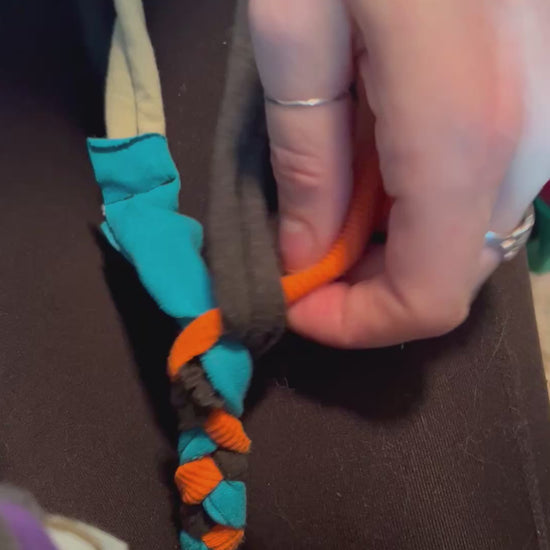 Braiding together tshirt strips to make into trivets and rugs
