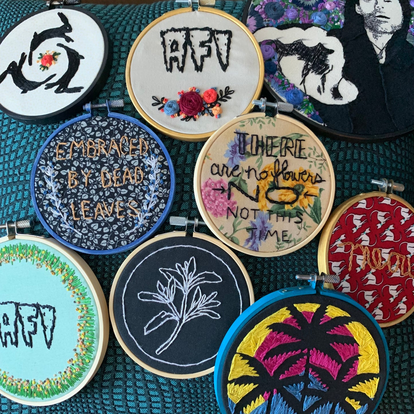 various embroidery hoops group, afi, cold cave, blaqk audio, meow, davey havok
