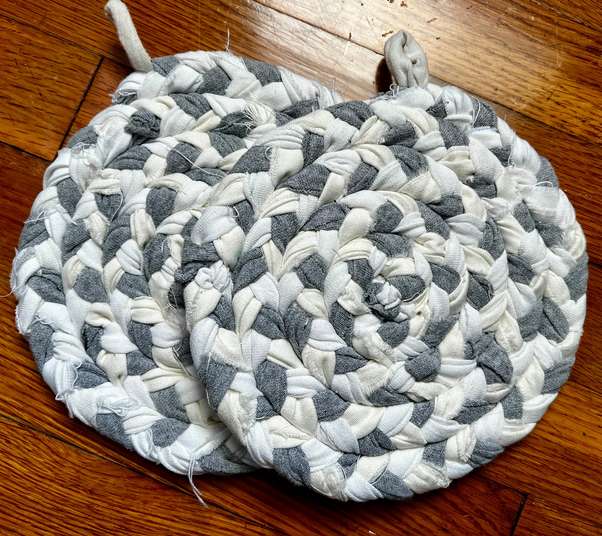 white grey potholders, hand braided and hand sewn